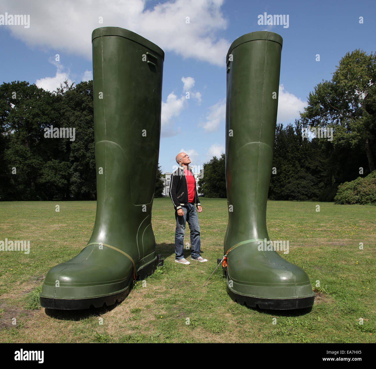 Huge rubber boots.Art by Lilian Bourgeat 1970.titled;Unsold boots.2009 Stock Photo