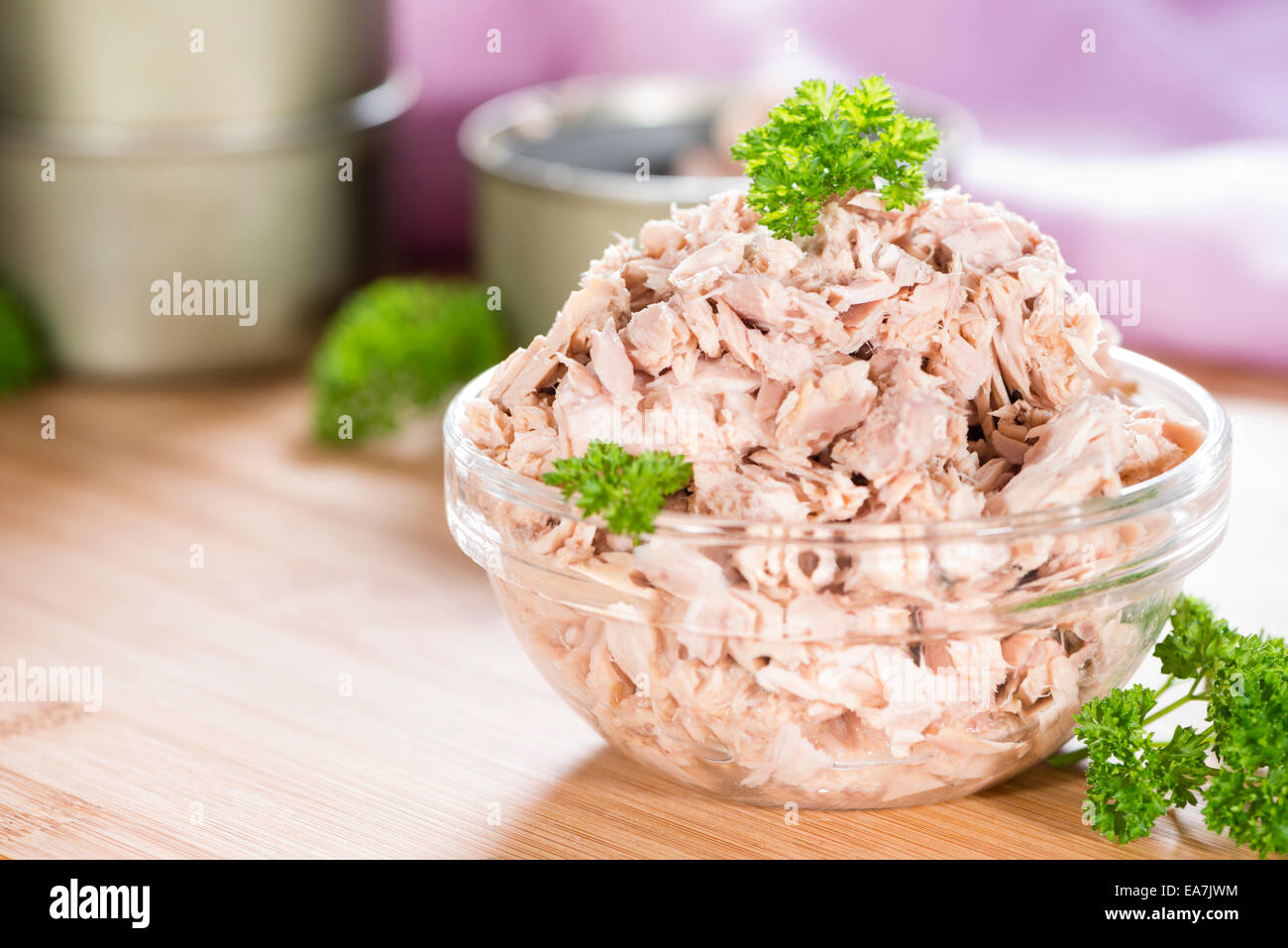 Portion of (canned) Tuna with fresh herbs as detailed closeup shot Stock Photo Alamy