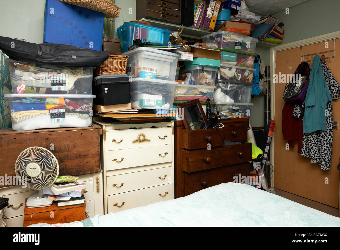 Bedroom filled with clutter Stock Photo