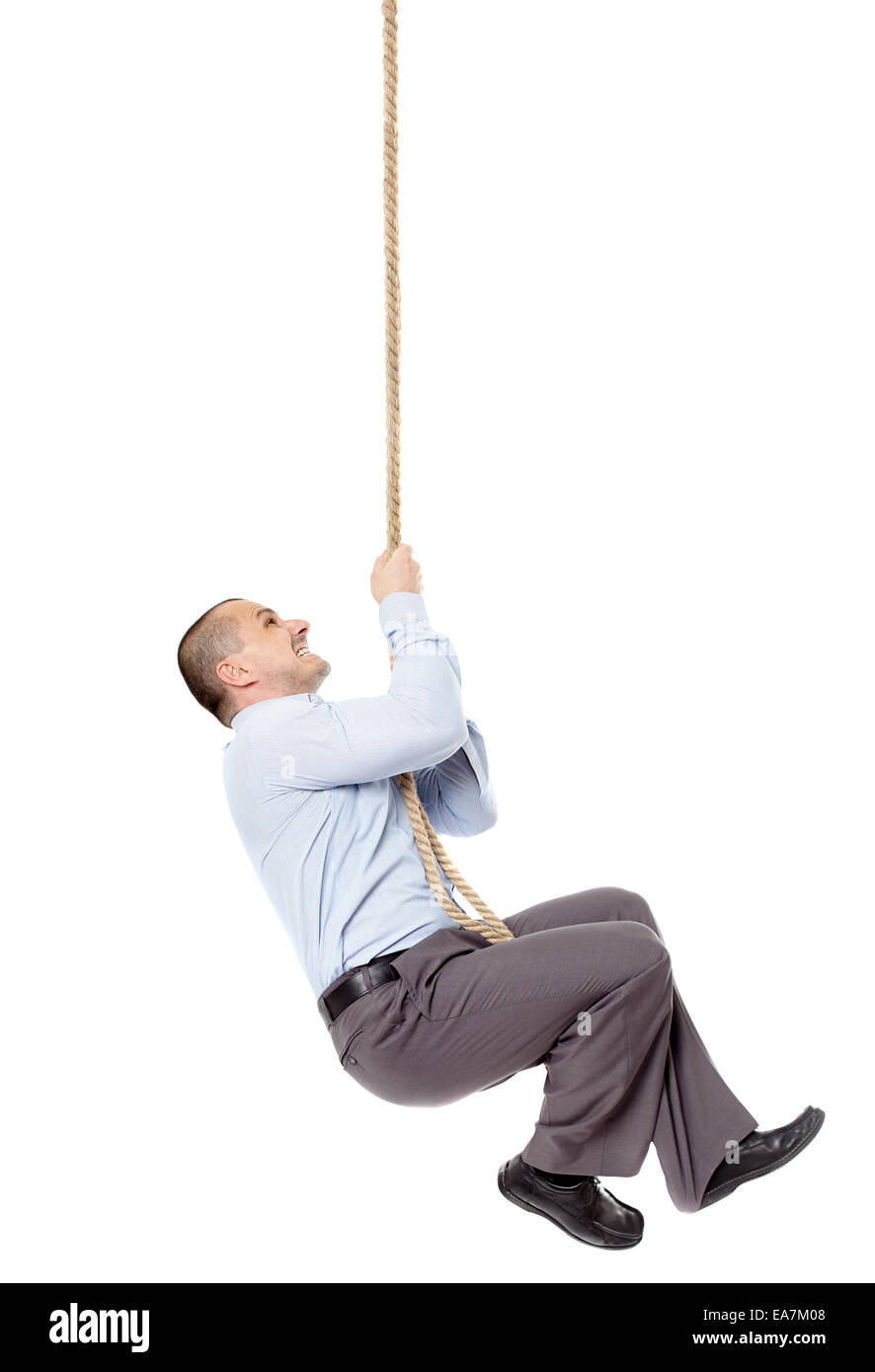 Businessman climbing a rope hi-res stock photography and images