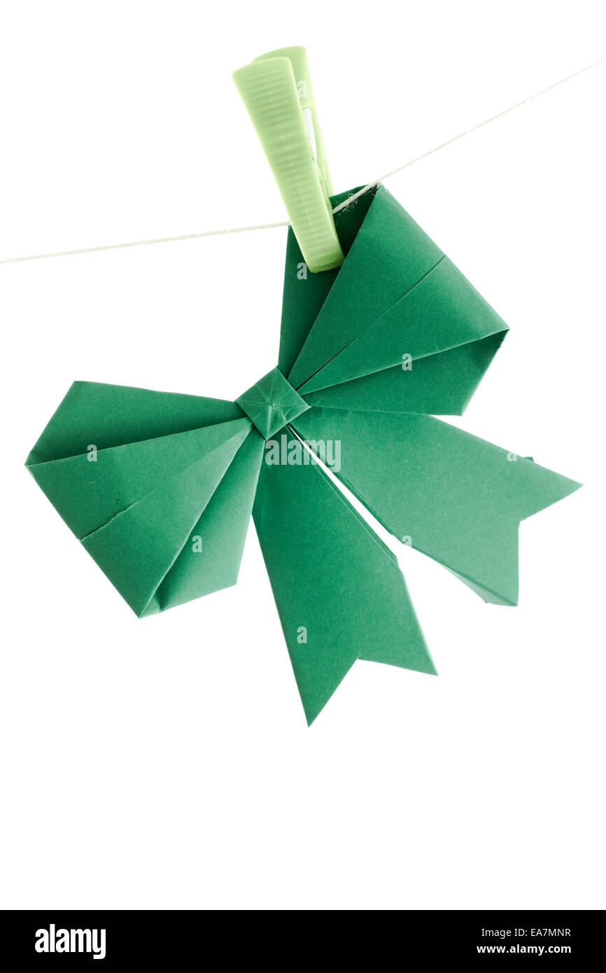 Green origami ribbon on white background Stock Photo - Alamy