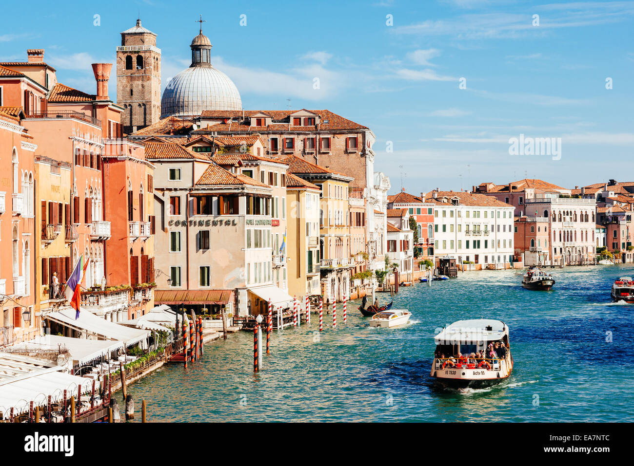 VENICE, ITALY - 26 OCTOBER 2014: Church San Geremia and ACTV vaporetto on Grand Canal. Vaporetto (waterbus) could be translated Stock Photo