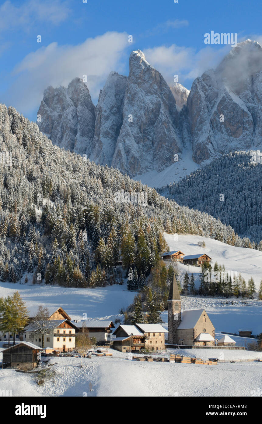 The church of St. Magdalena or Santa Maddalena, a village in front of the Geisler  dolomites mountain peaks in the Val di Funes. Stock Photo