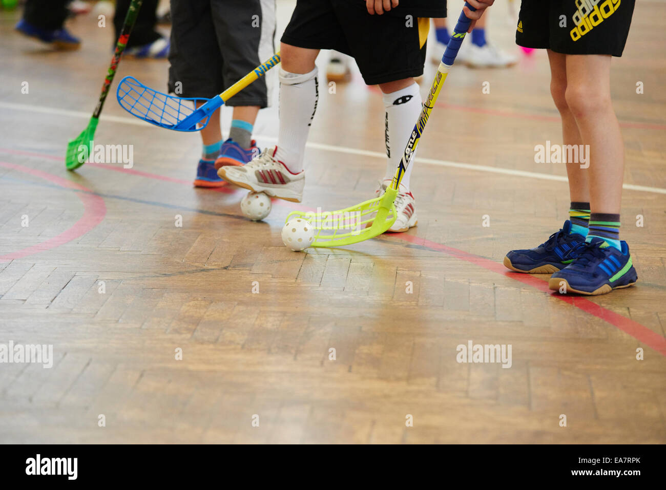 Children Schoolchildren Playing Floorball Floor Hockey Match In