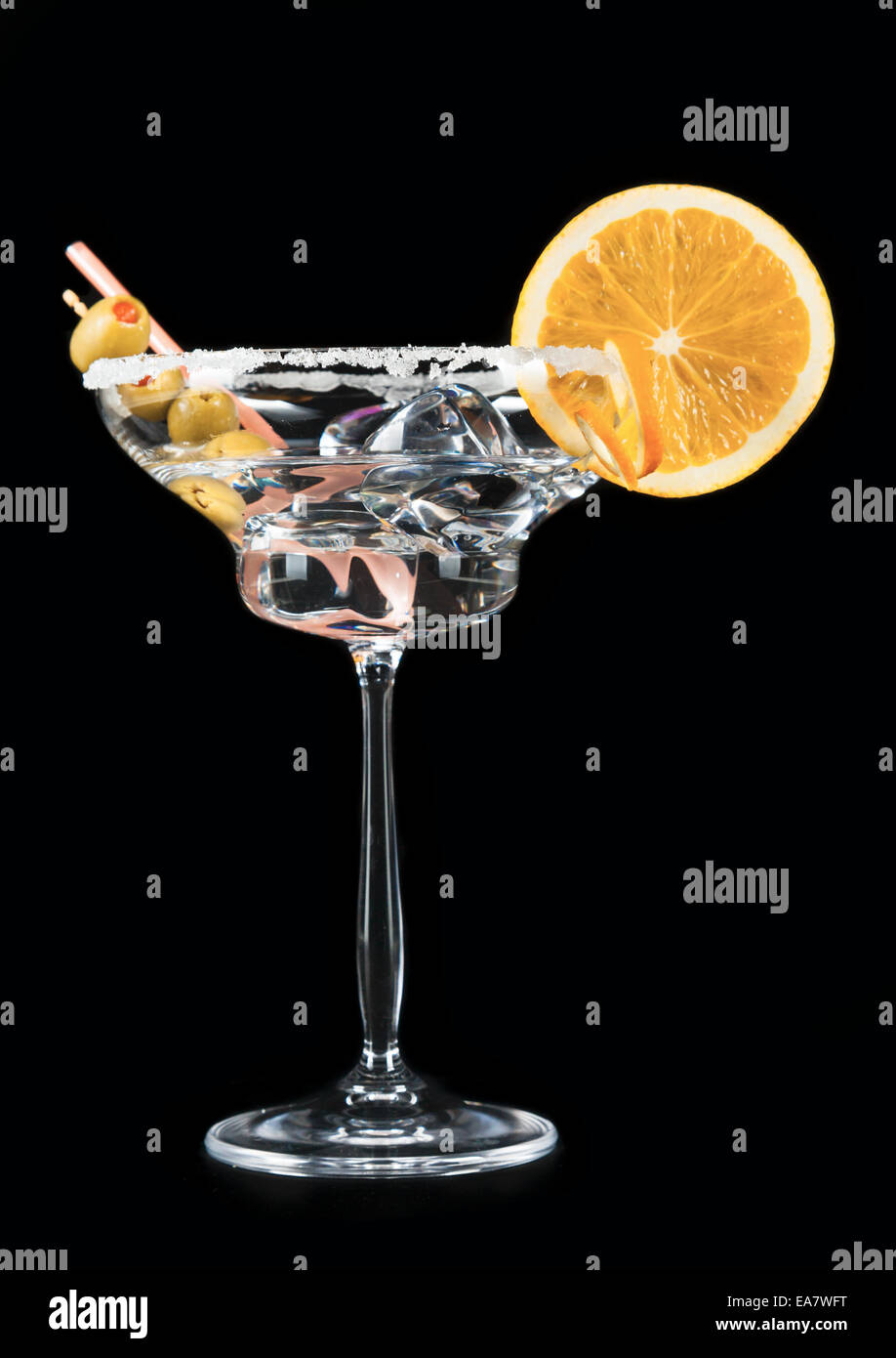 Glass of alcohol cocktail isolated on black background Stock Photo