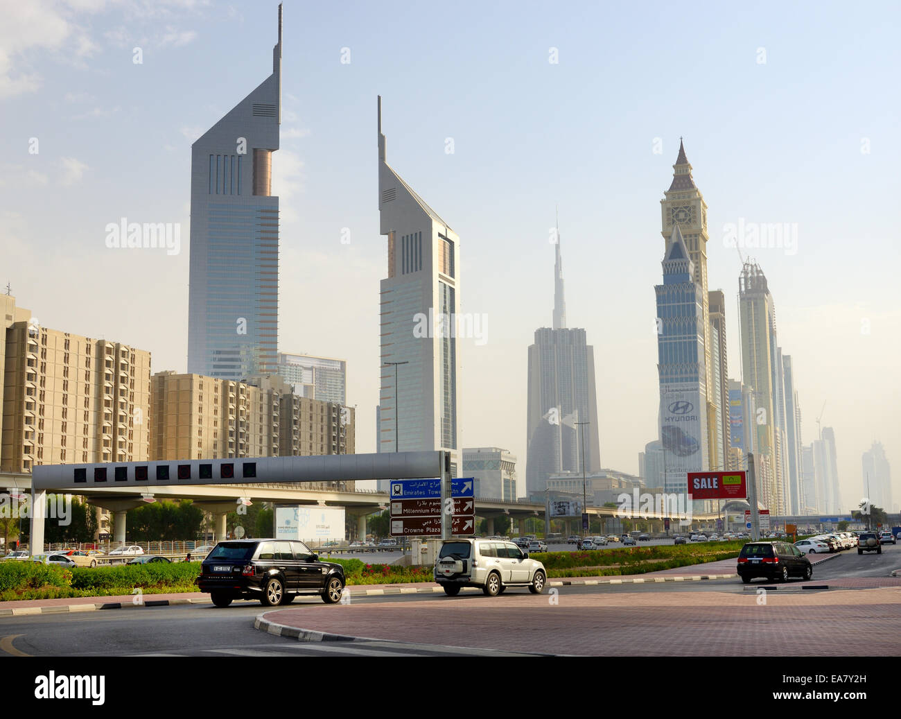The Dubai cityscape and Emirates towers, Dubai, UAE Stock Photo