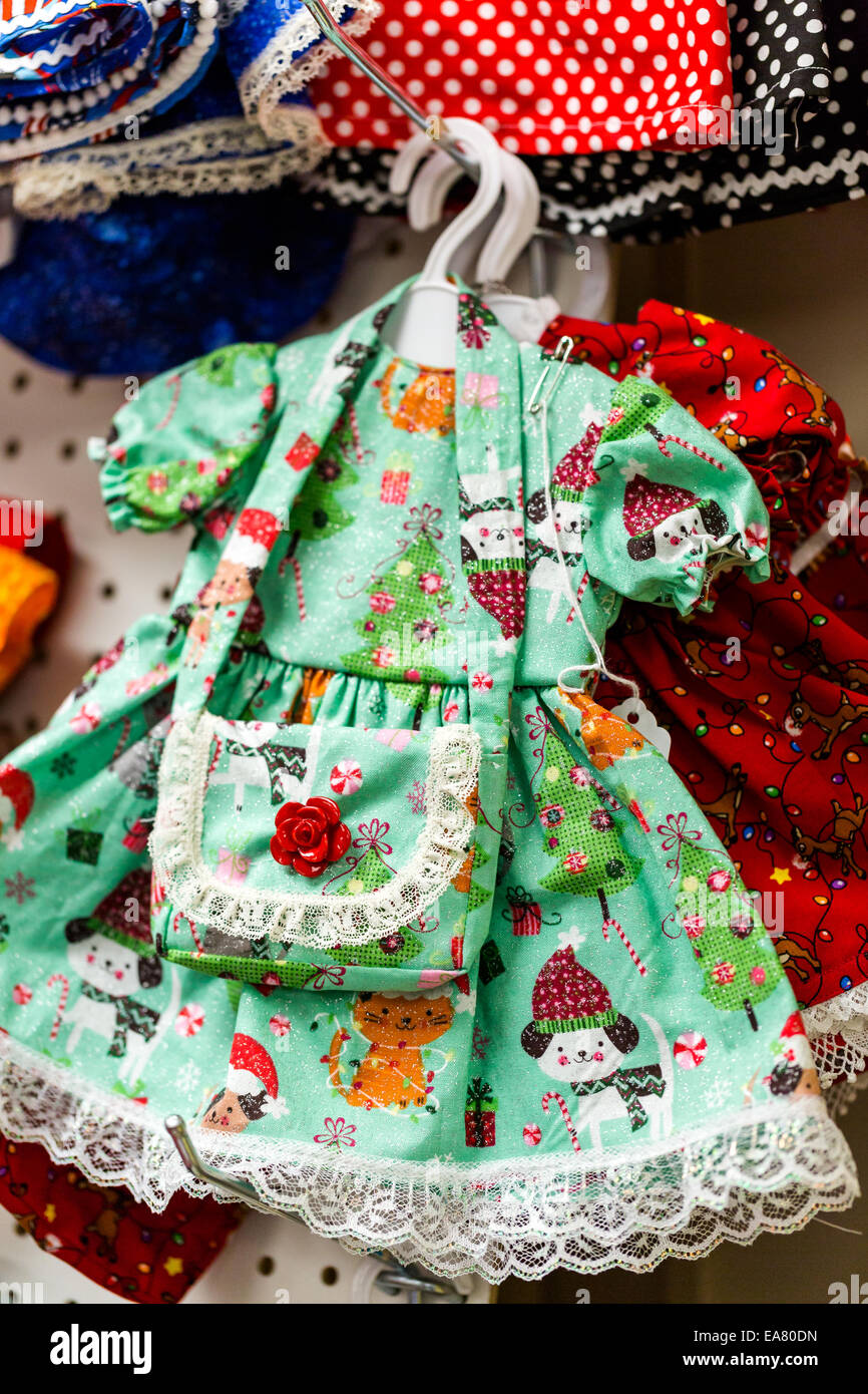 Handmade doll clothes for sale at the local craft market Stock Photo