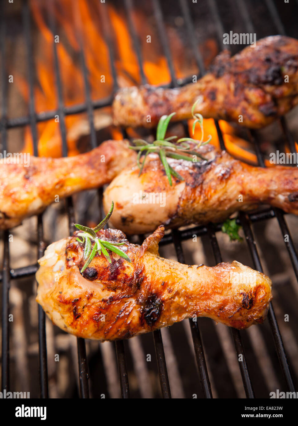 Grilled chicken legs on fire Stock Photo Alamy