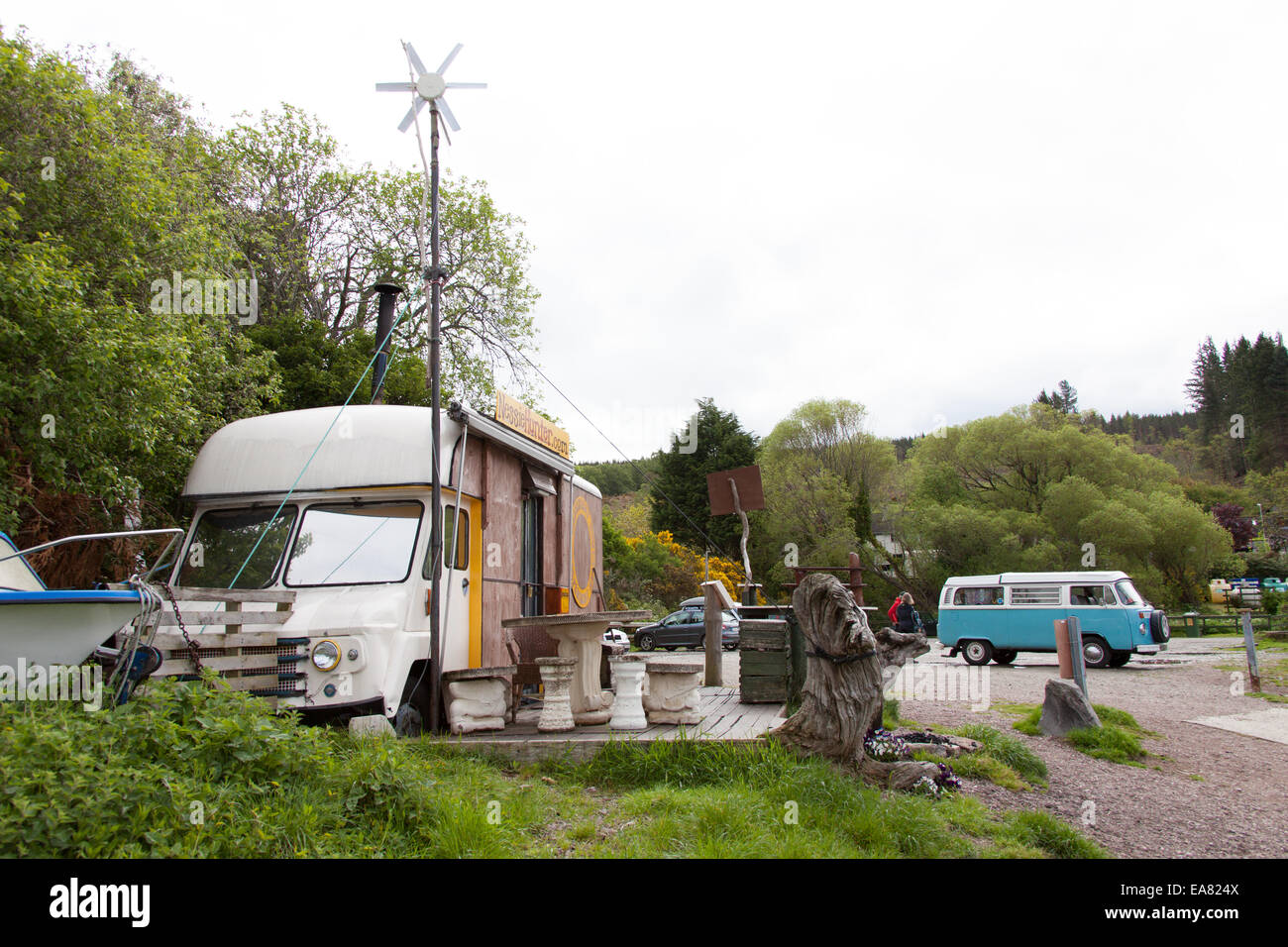 The home of Steve Feltham, full time Loch Ness monster hunter since 1991 on Dores Beach, Loch Ness, Scotland. He lives in a 1070 ex mobile library van, wood lined with a pot belly stove. Stock Photo