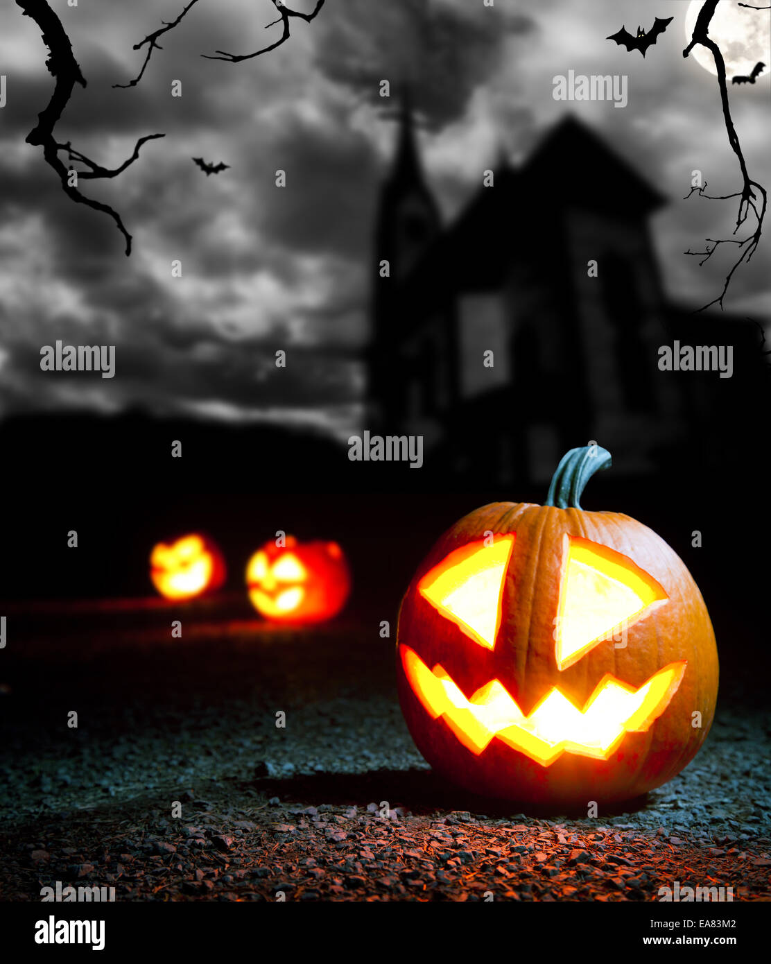 Burning evil halloween pumpkin with dark background Stock Photo - Alamy