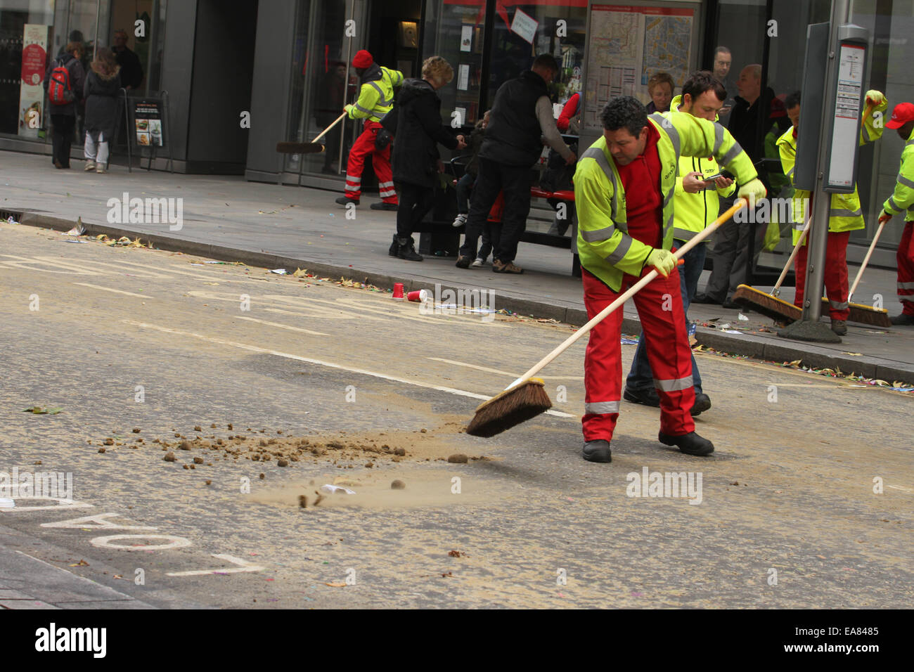 London, UK. 8th Nov, 2014. A street cleaner seen at work along the
