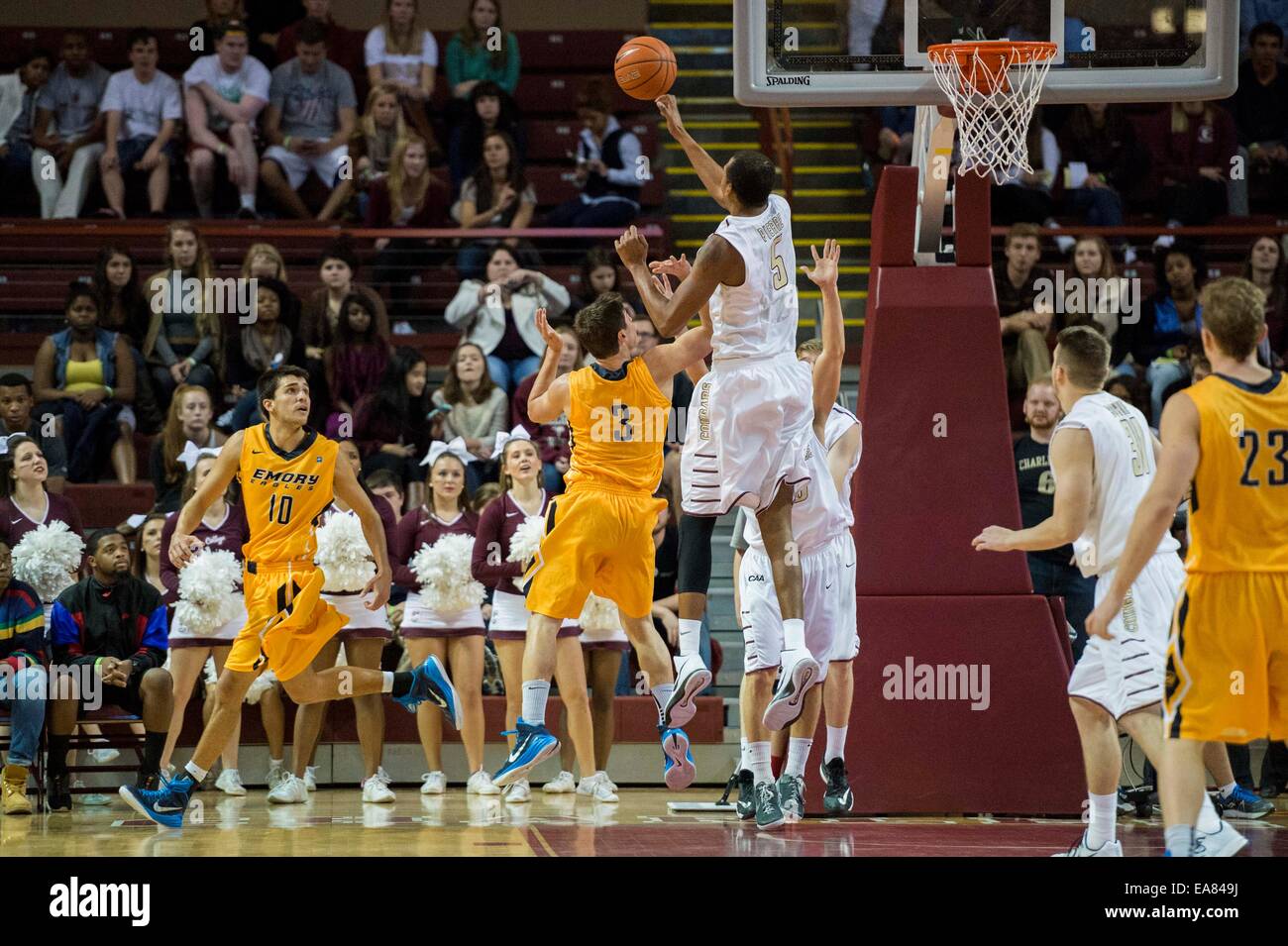Charleston, SC, USA. 8th Nov, 2014. College of Charleston F/C Glen Pierre, Jr. (5) blocks a shot from Emory G Michael Florin (3) during the NCAA Basketball game between Emory University and the College of Charleston at TD Arena on November 8, 2014 in Charleston, South Carolina.College of Charleston defeats Emory 78-68. Credit:  Cal Sport Media/Alamy Live News Stock Photo