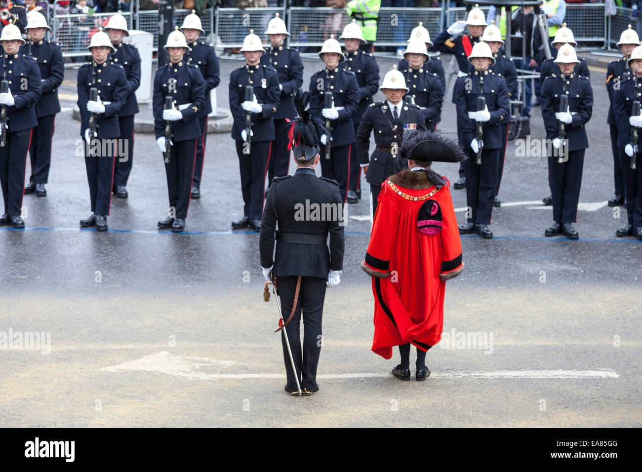 8th November 2014, Lord Mayor's Show, City of London, London, UK. The new Lord Mayor, Alan Yarrow, greets Her Majesty's Royal Marines at the start of the procession near Mansion House. The Lord Mayor's Show is the oldest civil procession in the world, it celebrates the start of a one-year term for the new Mayor of the City of London. Stock Photo