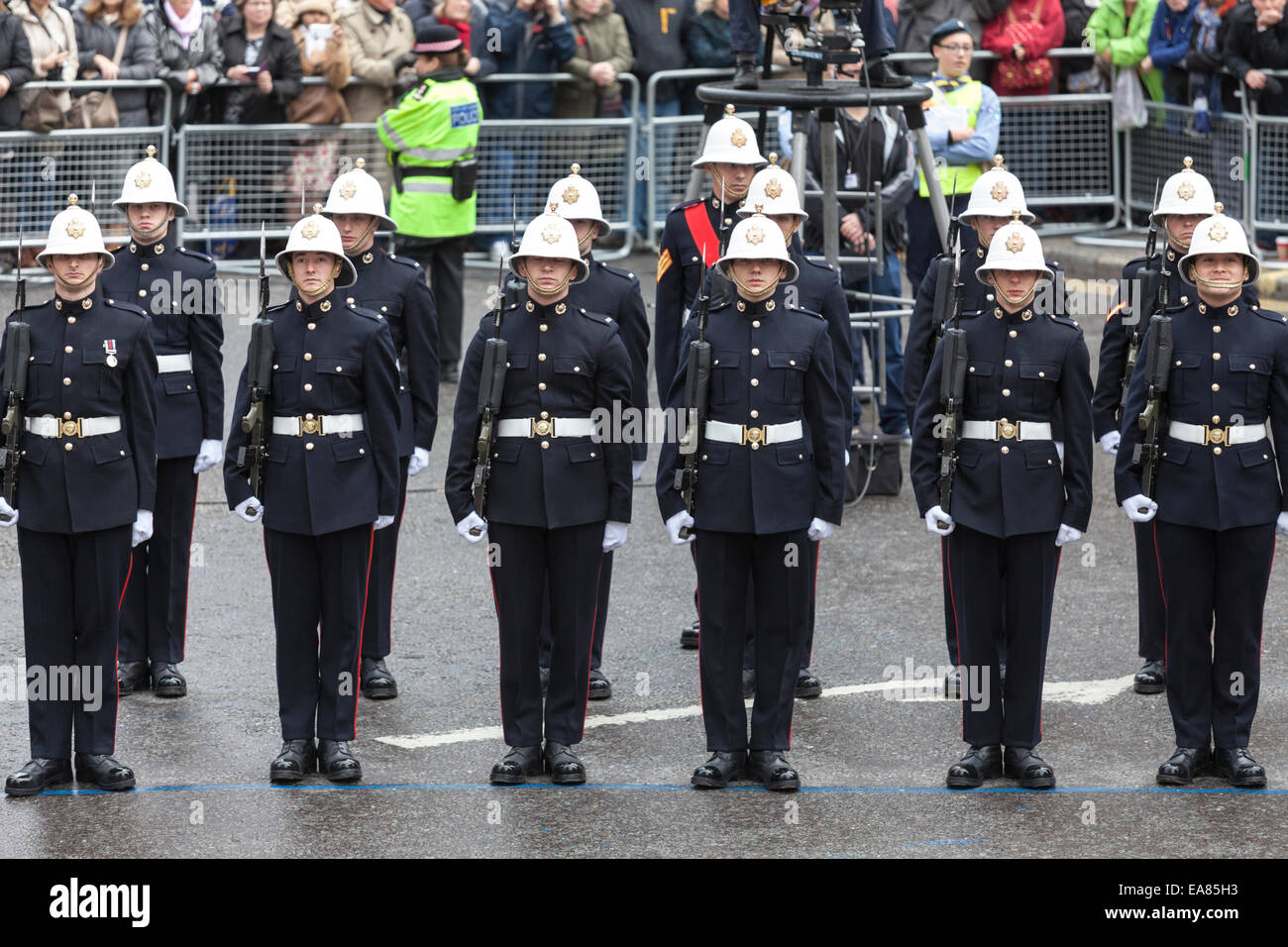 8th November 2014, Lord Mayor's Show, City of London, London, UK. Members of Her Majesty's Royal Marines stand in line at the start of the procession near Mansion House. The Lord Mayor's Show is the oldest civil procession in the world, it celebrates the start of a one-year term for the new Mayor of the City of London. Stock Photo