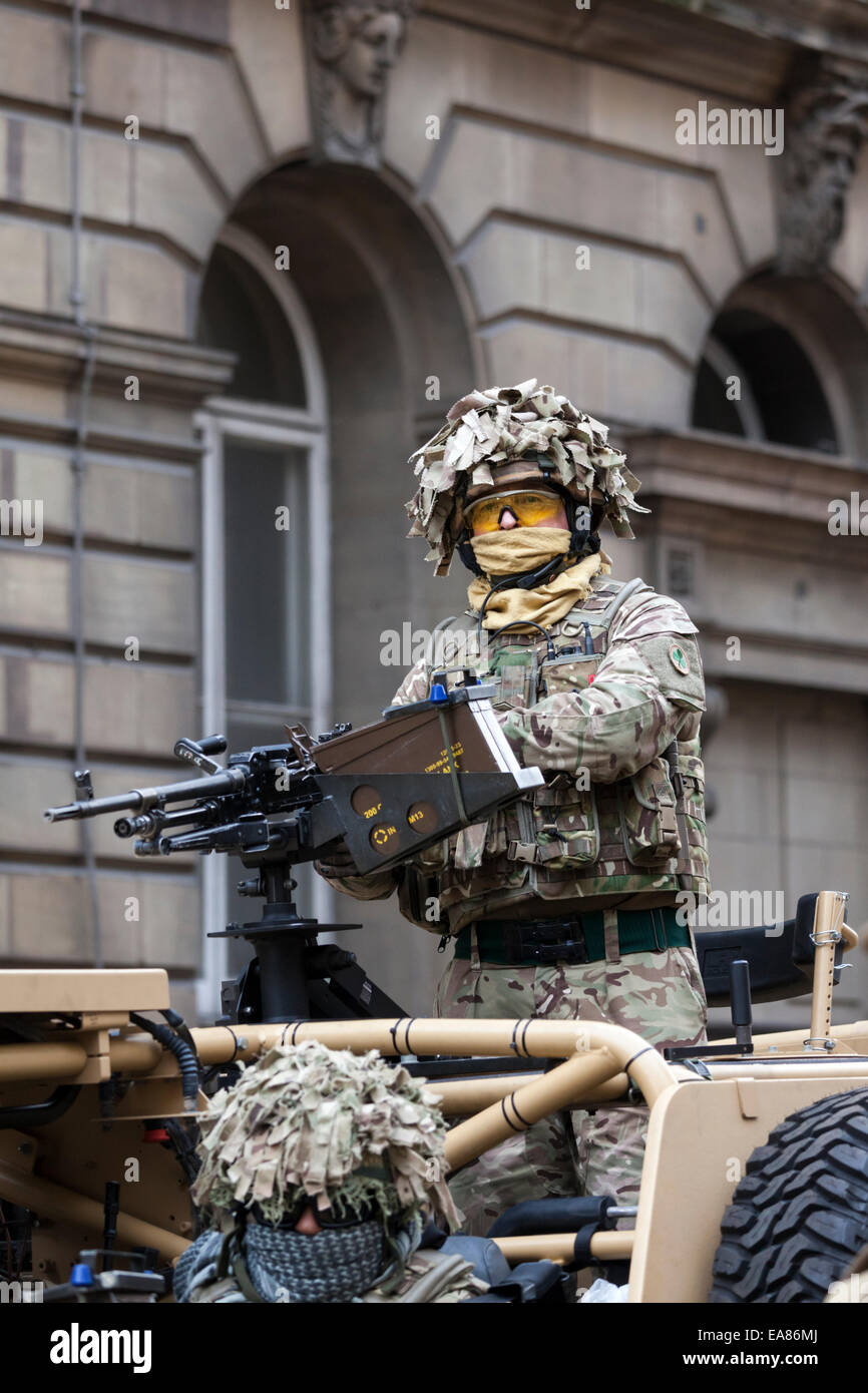8th November 2014, Lord Mayor's Show, City of London, London, UK.  A camouflaged soldier in an armoured vehicle that takes part in the procession. The Lord Mayor's Show is the oldest civil procession in the world, it celebrates the start of a one-year term for the new Mayor of the City of London. Stock Photo