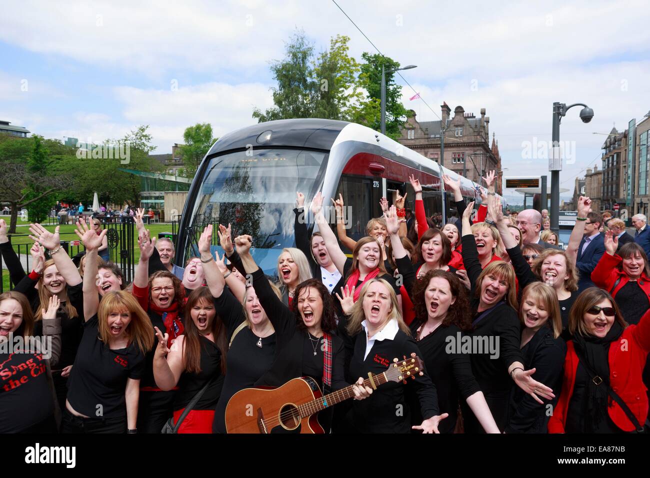 Member of the Sing in the city group playing in the official launch of Edinburgh Tram. Edinburgh
