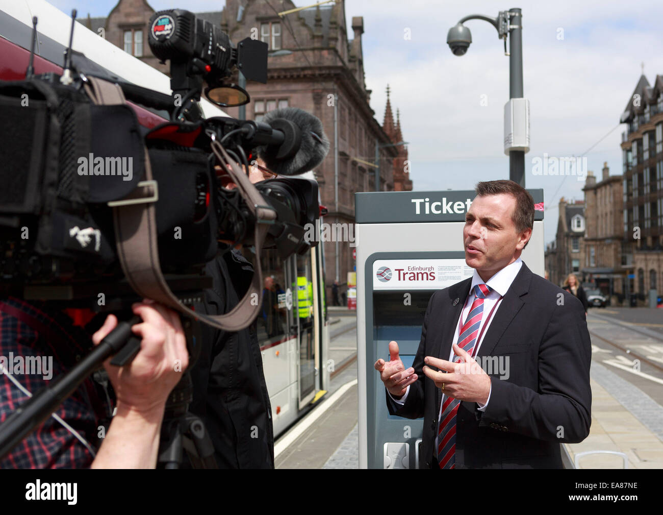 Members of TV with Ian Craig, Chief Executive of Transport for Edinburgh. Edinburgh Trams Passenger services Stock Photo