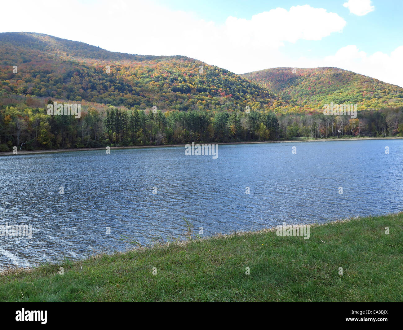 The public drinking water reservoir for the city of North Adams has a beautiful view of Mount Greylock in the fall. Stock Photo