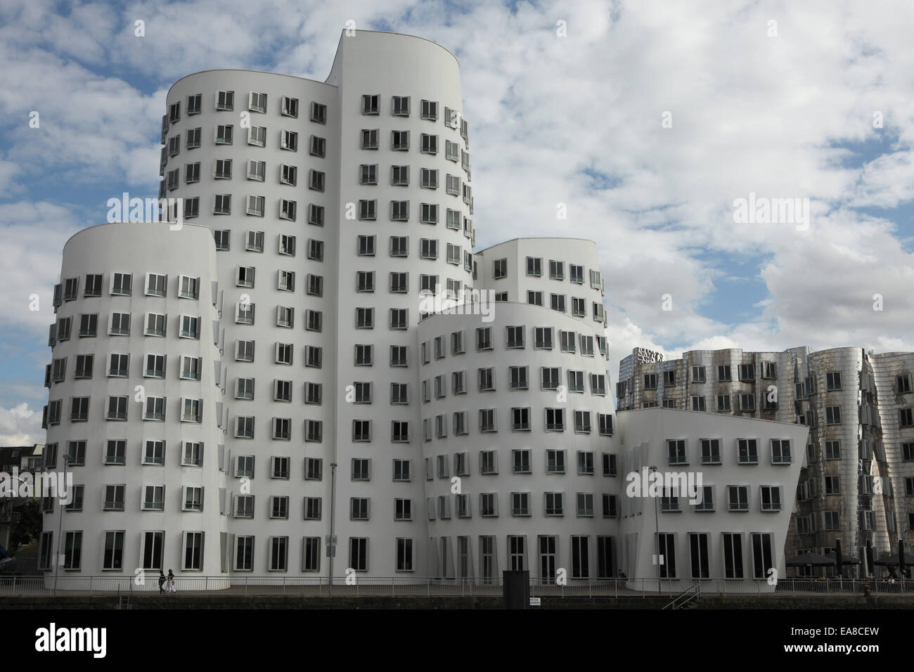 The Neuer Zollhof designed by architect Frank Gehry in the Medienhafen District in Düsseldorf, North Rhine-Westphalia, Germany. Stock Photo