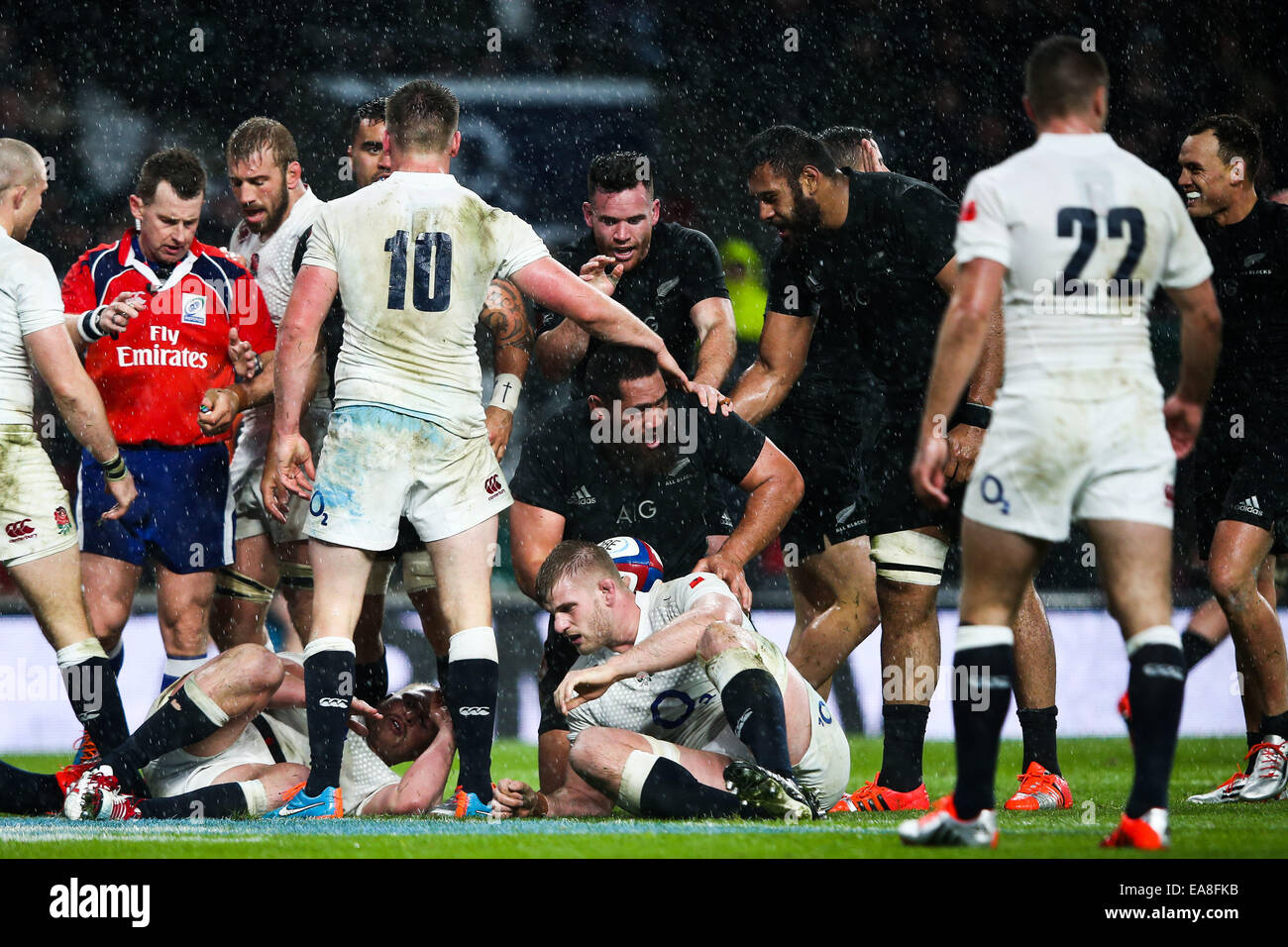 London, UK. 8th Nov, 2014. New Zealand's Charlie Faumuina gets up after having finished off the drive from New Zealand's Ryan Crotty - QBE Autumn Internationals - England vs New Zealand. Credit:  Cal Sport Media/Alamy Live News Stock Photo
