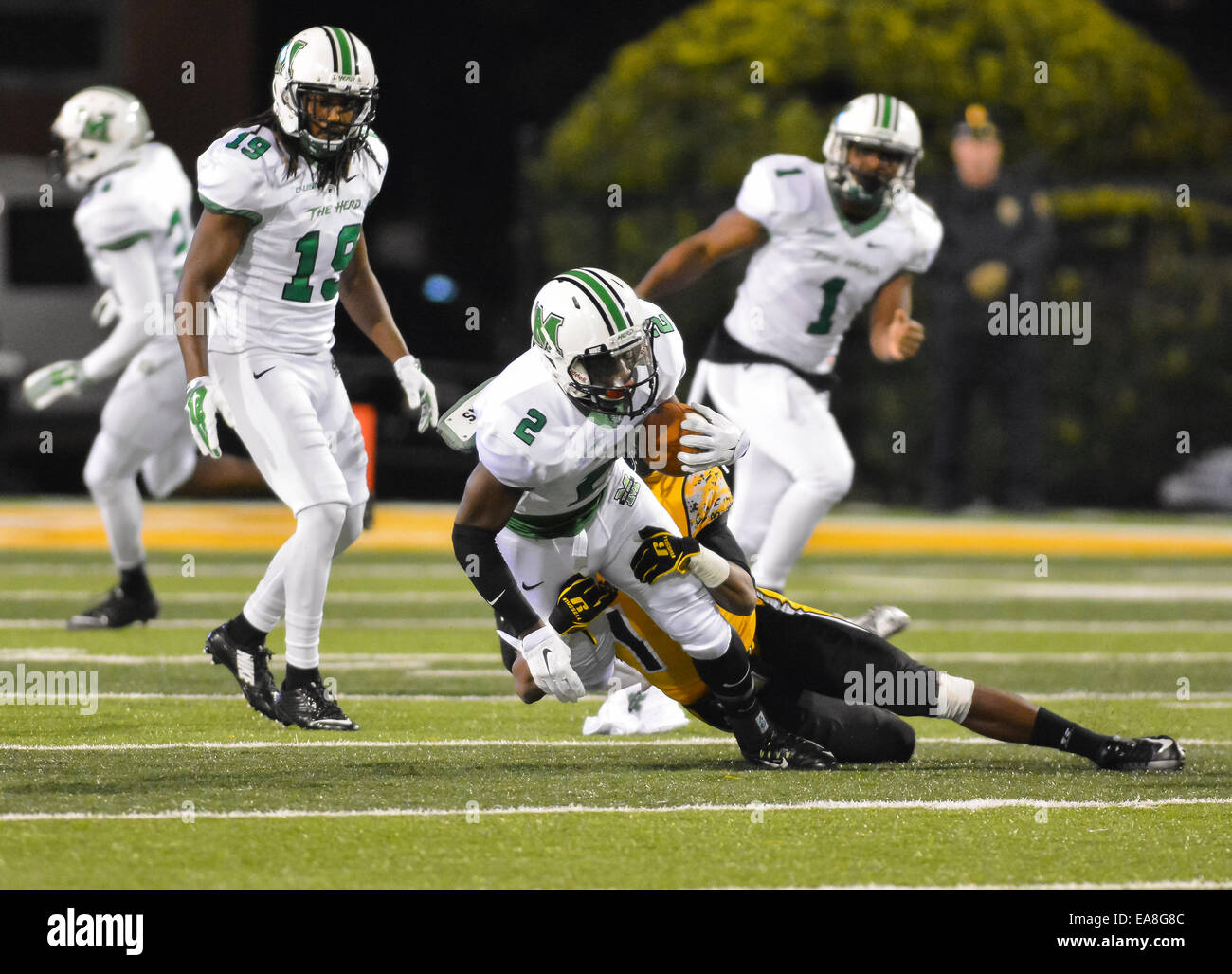 November 8, 2014:Marshall Thundering Herd wide receiver Hyleck Foster (2) is tackled by Southern Miss Golden Eagles defensive back Xavier Marion (1) during the NCAA Football game between the Southern Miss Golden Eagles and the Marshall Thundering Herd at M.M. Roberts Stadium in Hattiesburg MS. Matt Bush/CSM Stock Photo