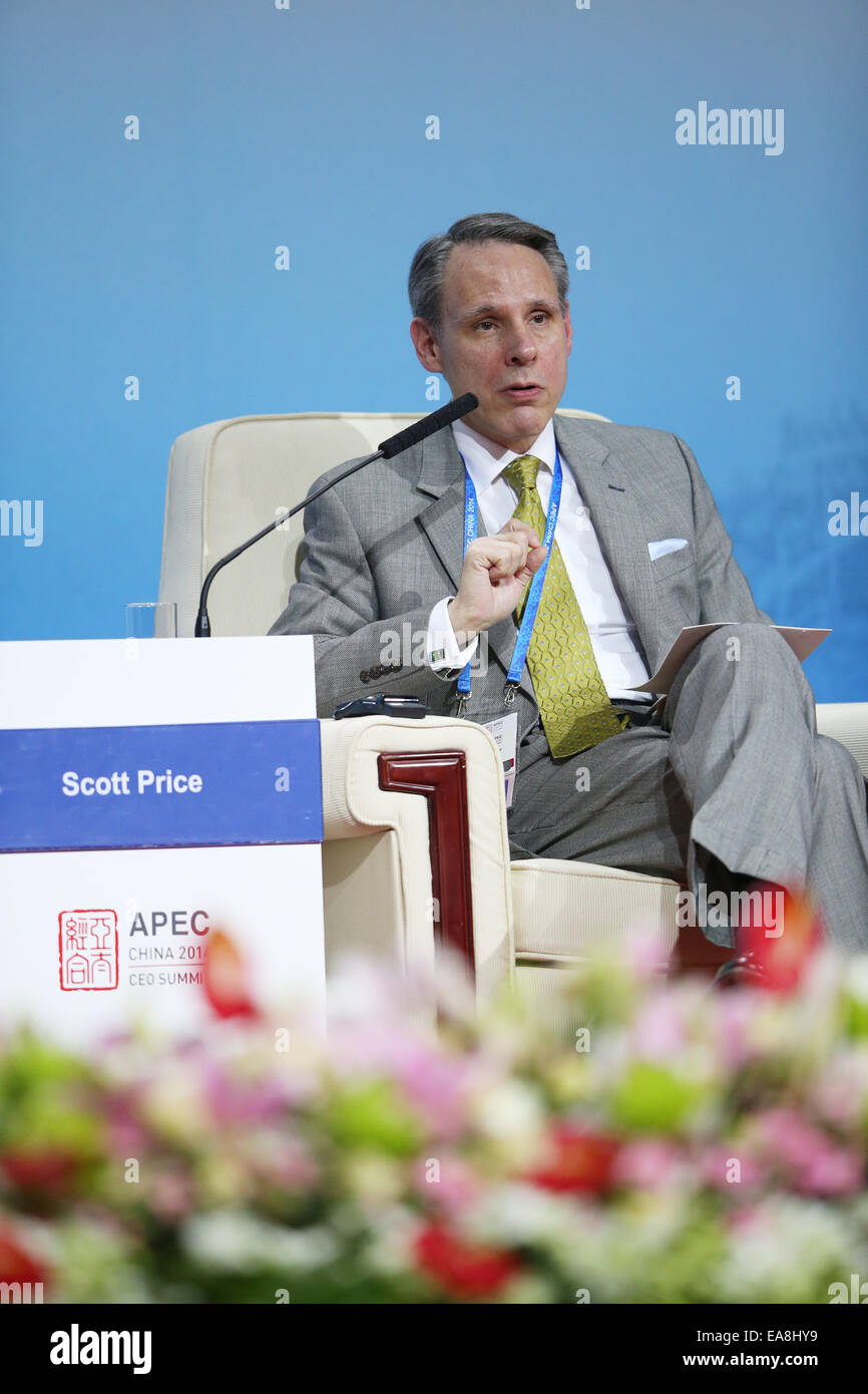 Beijing, China. 9th Nov, 2014. Scott Price, Executive Vice President of Strategy and International Development of Walmart International, speaks in a summit review on the state of the global economy during the 2014 Asia-Pacific Economic Cooperation (APEC) CEO Summit in Beijing, capital of China, Nov. 9, 2014. The 2014 APEC CEO Summit opened in Beijing on Sunday. Credit:  Jin Liwang/Xinhua/Alamy Live News Stock Photo