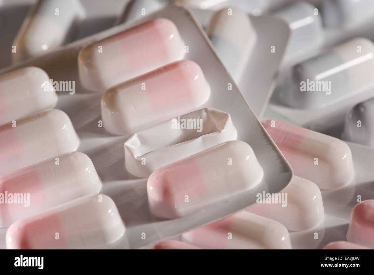 Pain relief drug capsule and blister package to protect and ensure sell by date not exceeded Stock Photo