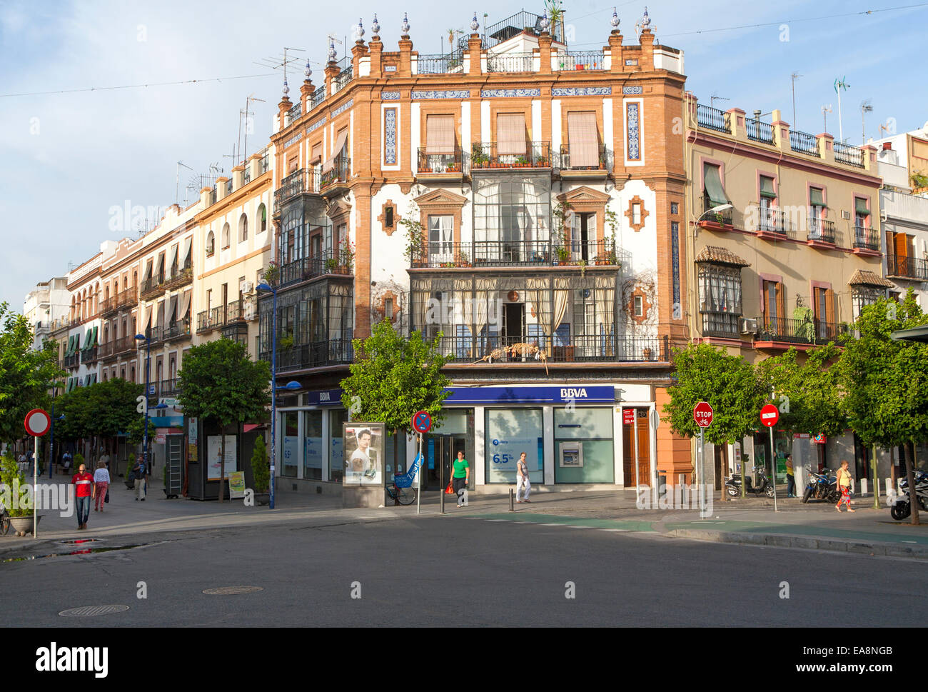 Historic buildings in Plaza del Altozano, Triana district, Seville, Spain, glass-fronted balconies called miradores Stock Photo
