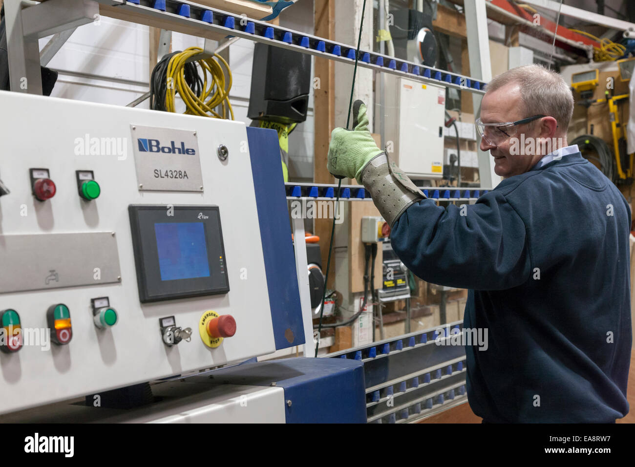 A Bohle glass grinding and milling machine used to smooth the edges of large panes of glass