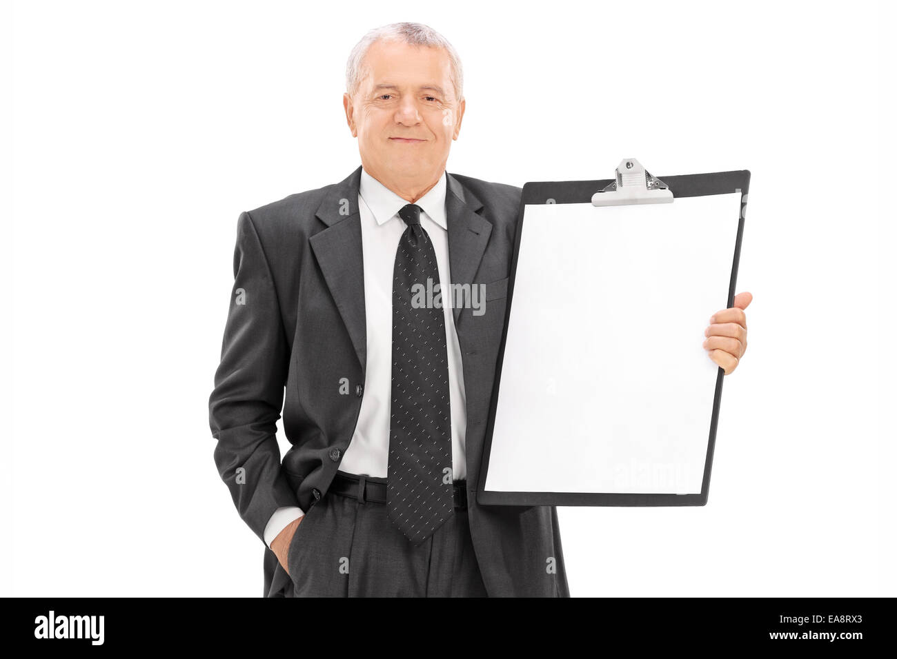 Mature businessman holding a huge clipboard isolated on white ...
