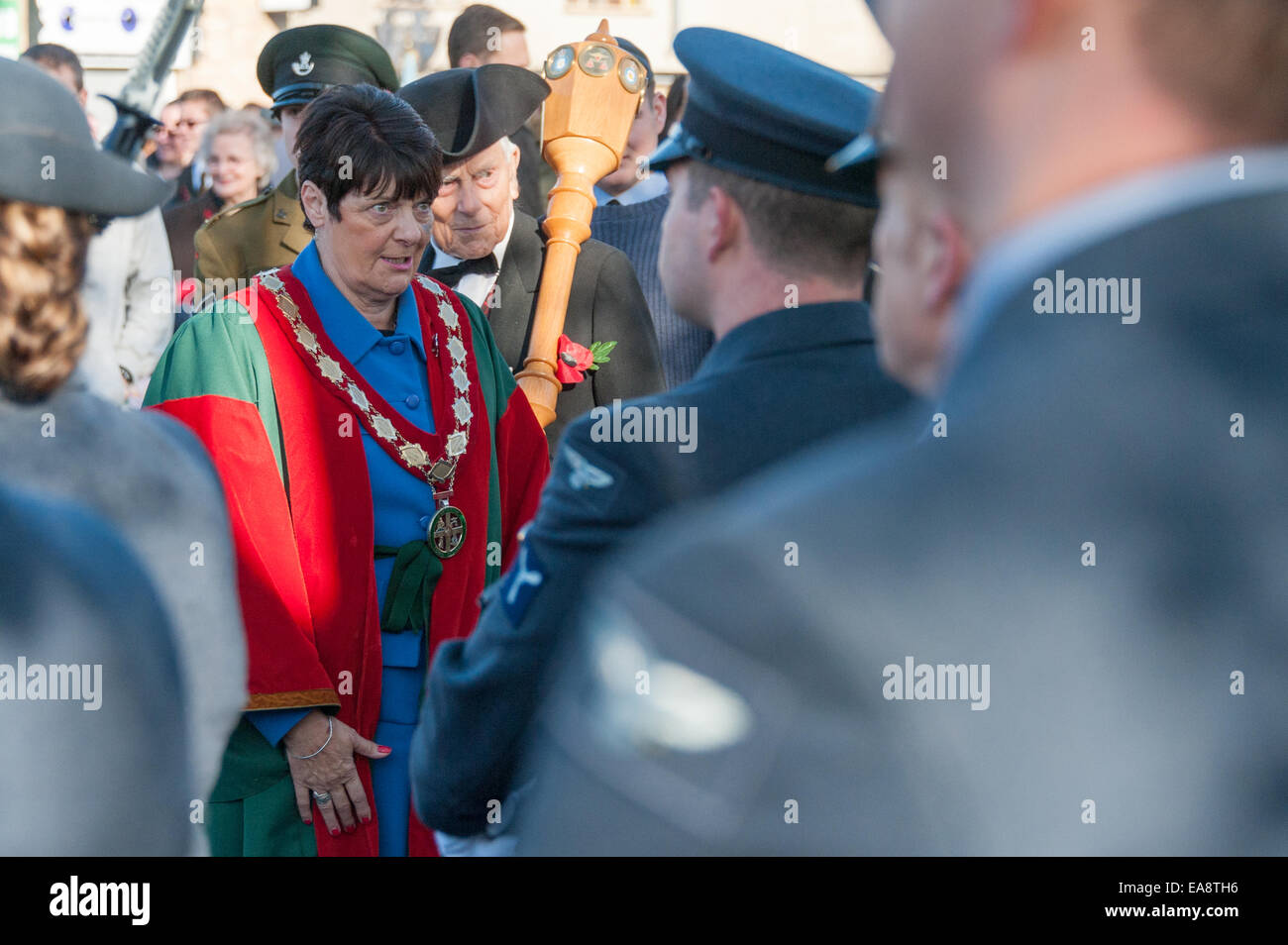 Carterton, Oxfordshire, UK. 9th November, 2014. Town Mayor, Cllr Mrs Lynn Little (01993 842269 ) talks to serving members of the RAF following the Remembrance Sunday Parade in Carterton Oxfordshire. Credit:  Desmond Brambley/Alamy Live News Stock Photo
