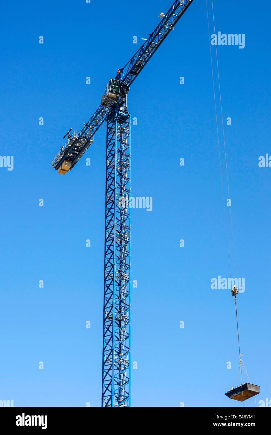 Building site stationary crane with a blue sky background Stock Photo ...