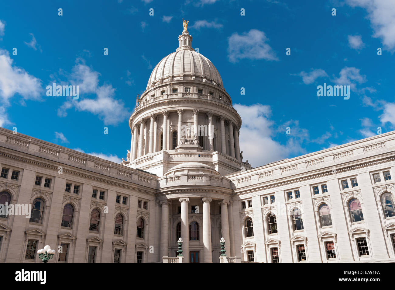 Beaux Arts style architecture of Wisconsin State Capitol and dome under blue skies Stock Photo