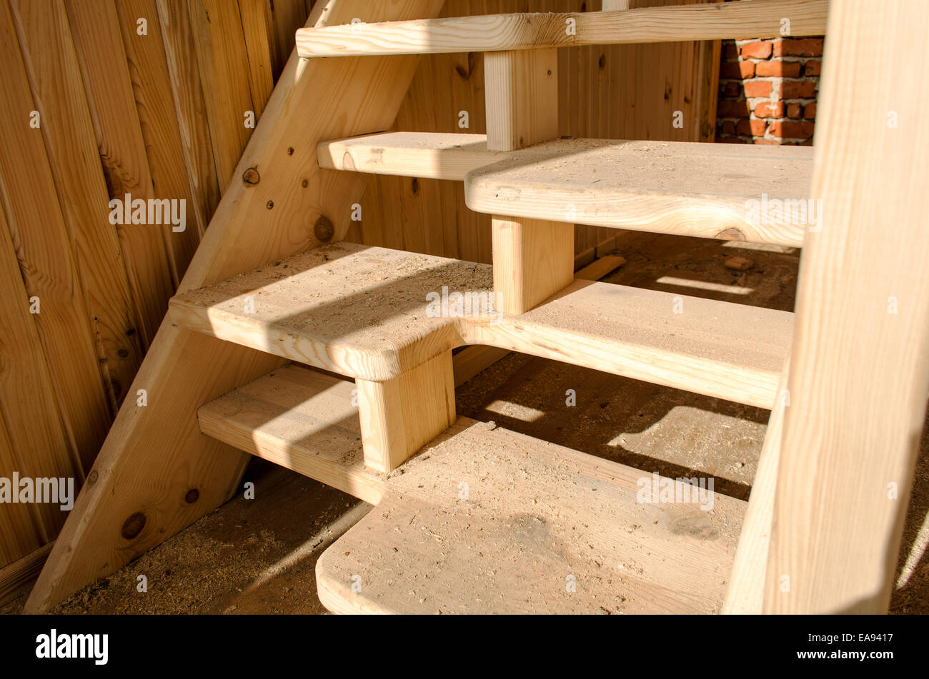 Incomplete Architectural Wooden Interior Design with Stairs Stock Photo