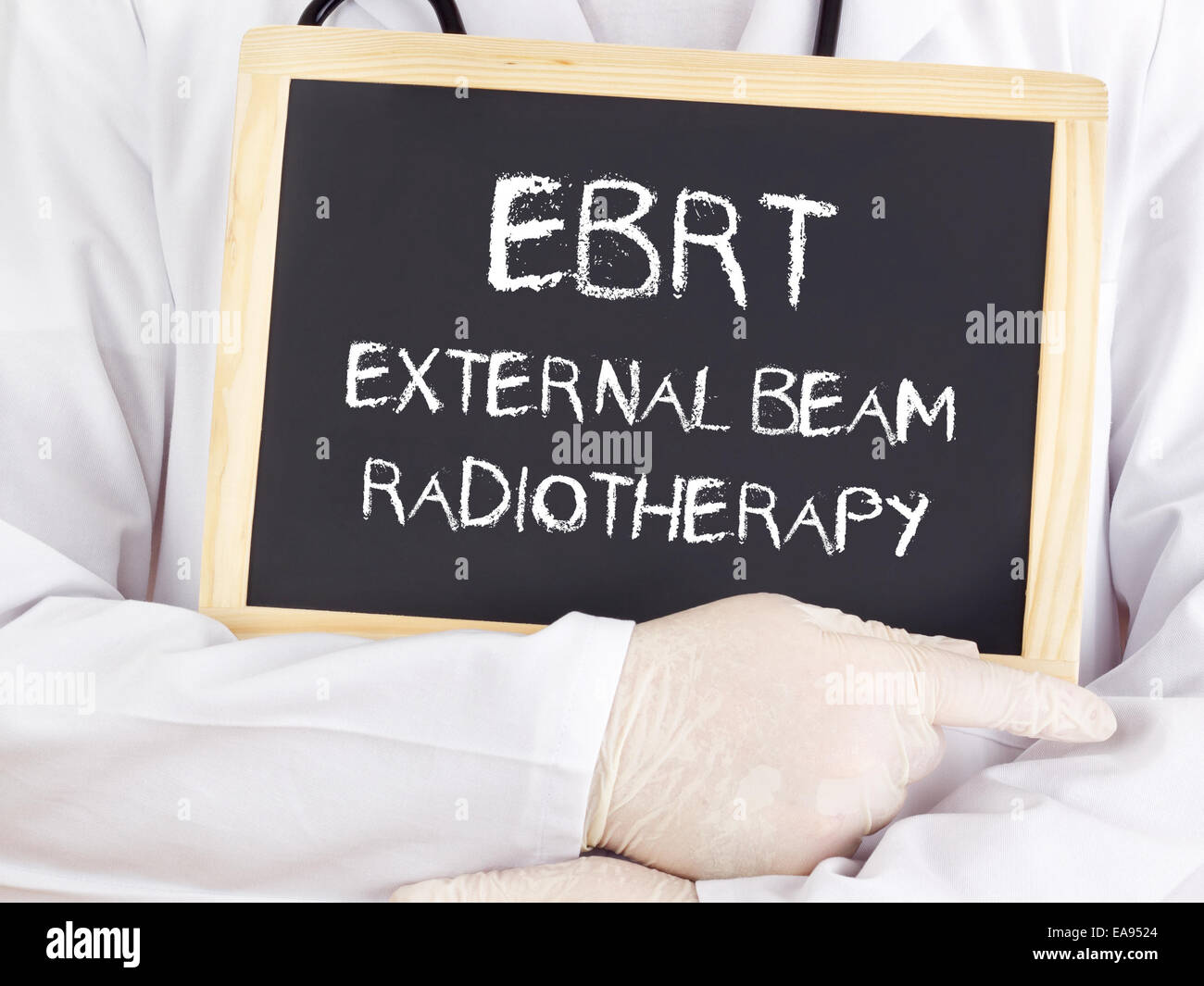 Doctor shows information: EBRT external beam radiotherapy Stock Photo