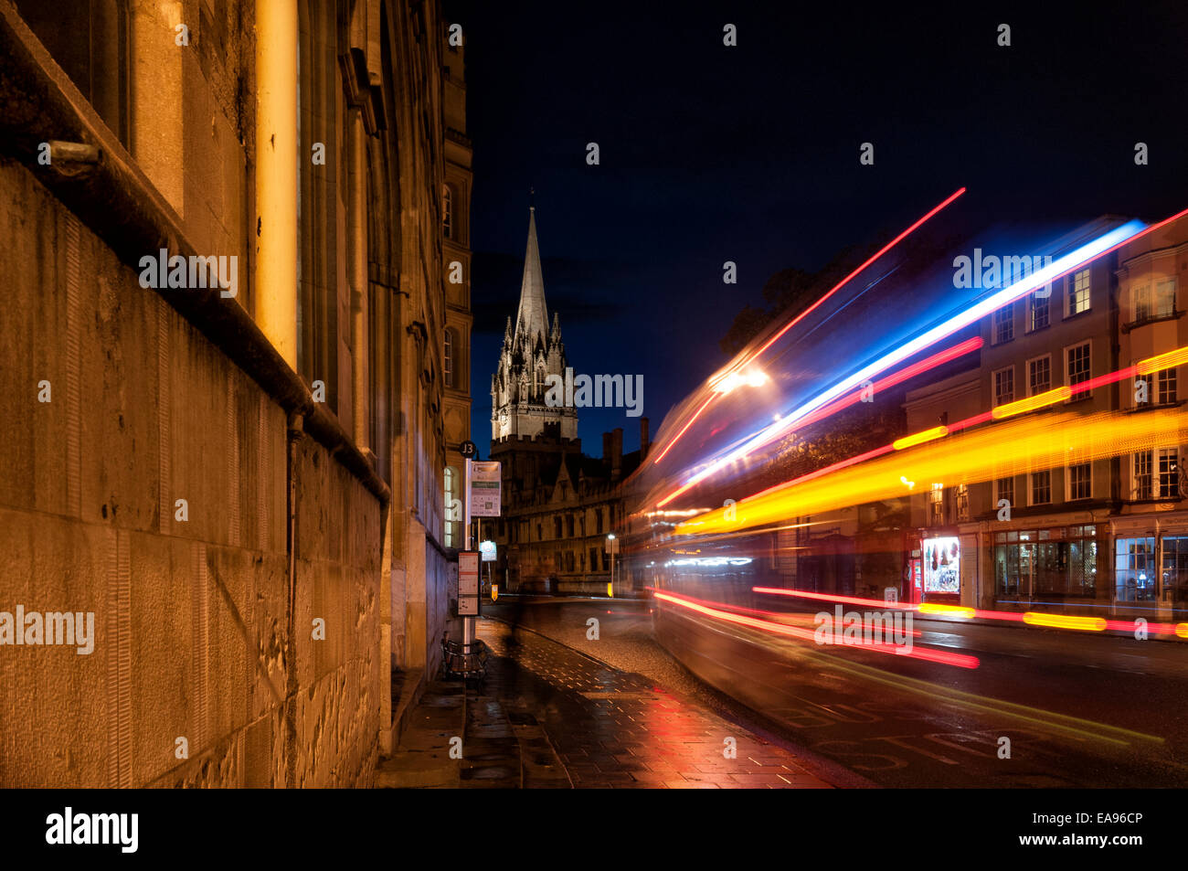 Oxford high street at night with streaks of light from a passing bus Stock Photo