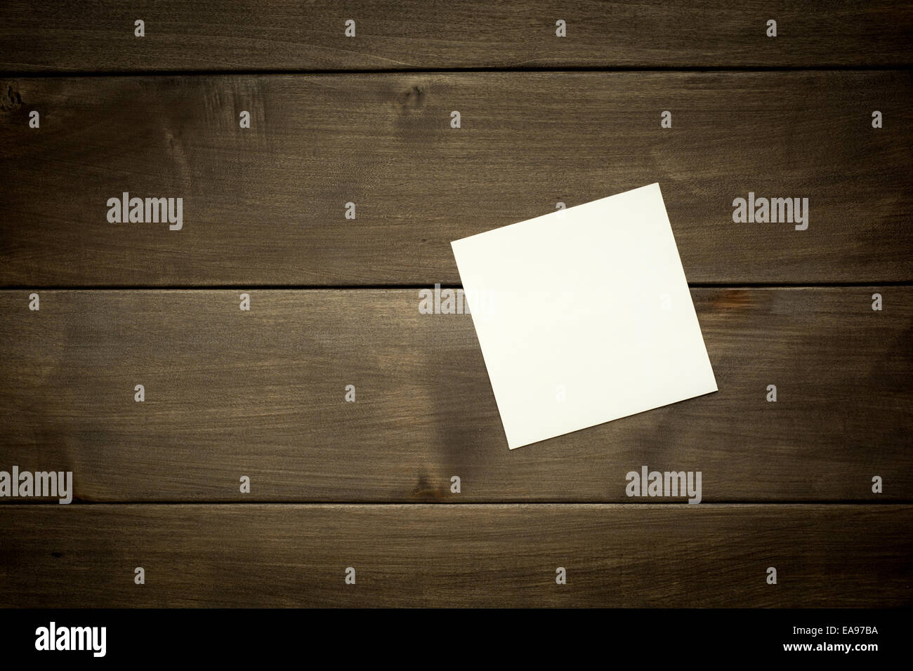 Vintage postcard on wooden table Stock Photo