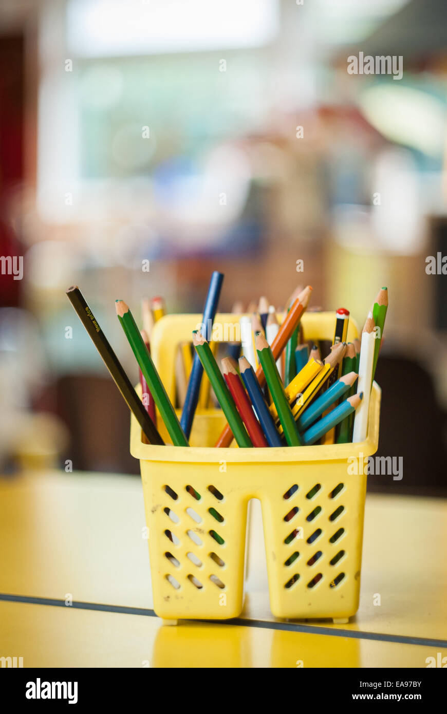 Classroom pencils in an empty school classroom. Stock Photo