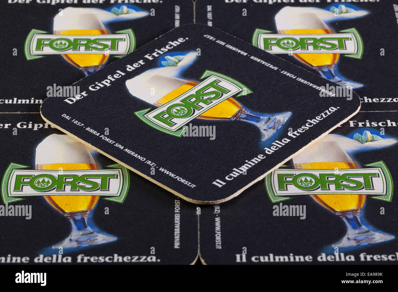 GERMANY,STRASBOURG - November 9, 2014: Beermats from Forst beer.Forst is an Italian brewing company, based in Forst, a frazione Stock Photo