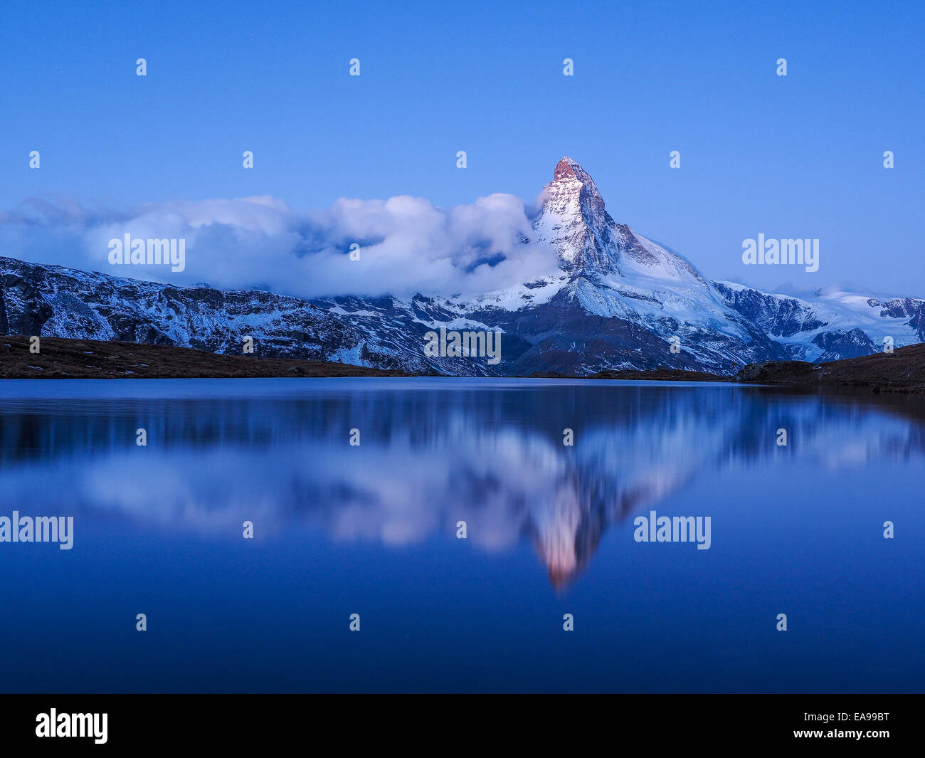 Matterhorn during night with relfection in StelliSee, Zermatt, Switzerland Stock Photo