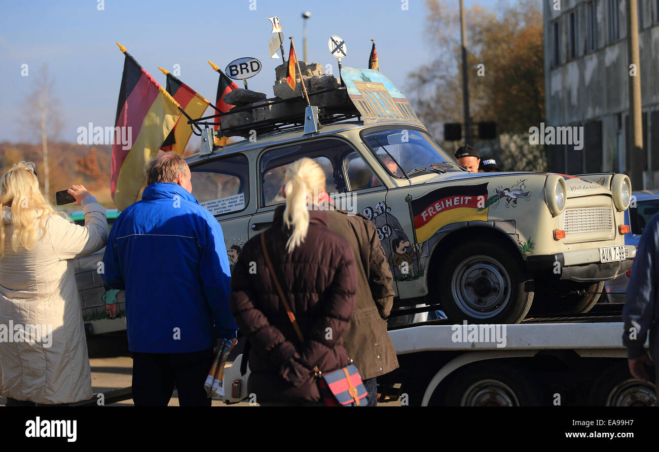 Marienborn, Germany. 9th Nov, 2014. An East German Trabant car model is on display at the memorial site 'Deutsche Teilung' (German Divide) which hosts numerous events on the occasion of the 25th anniversary at the former border corssing in Marienborn, Germany, 9 November 2014. Marienburg was the largest and one of the most important border crossings to East Germany in particular because of its transite rout leading towards West Berlin. Photo: Jens Wolf/dpa/Alamy Live News Stock Photo