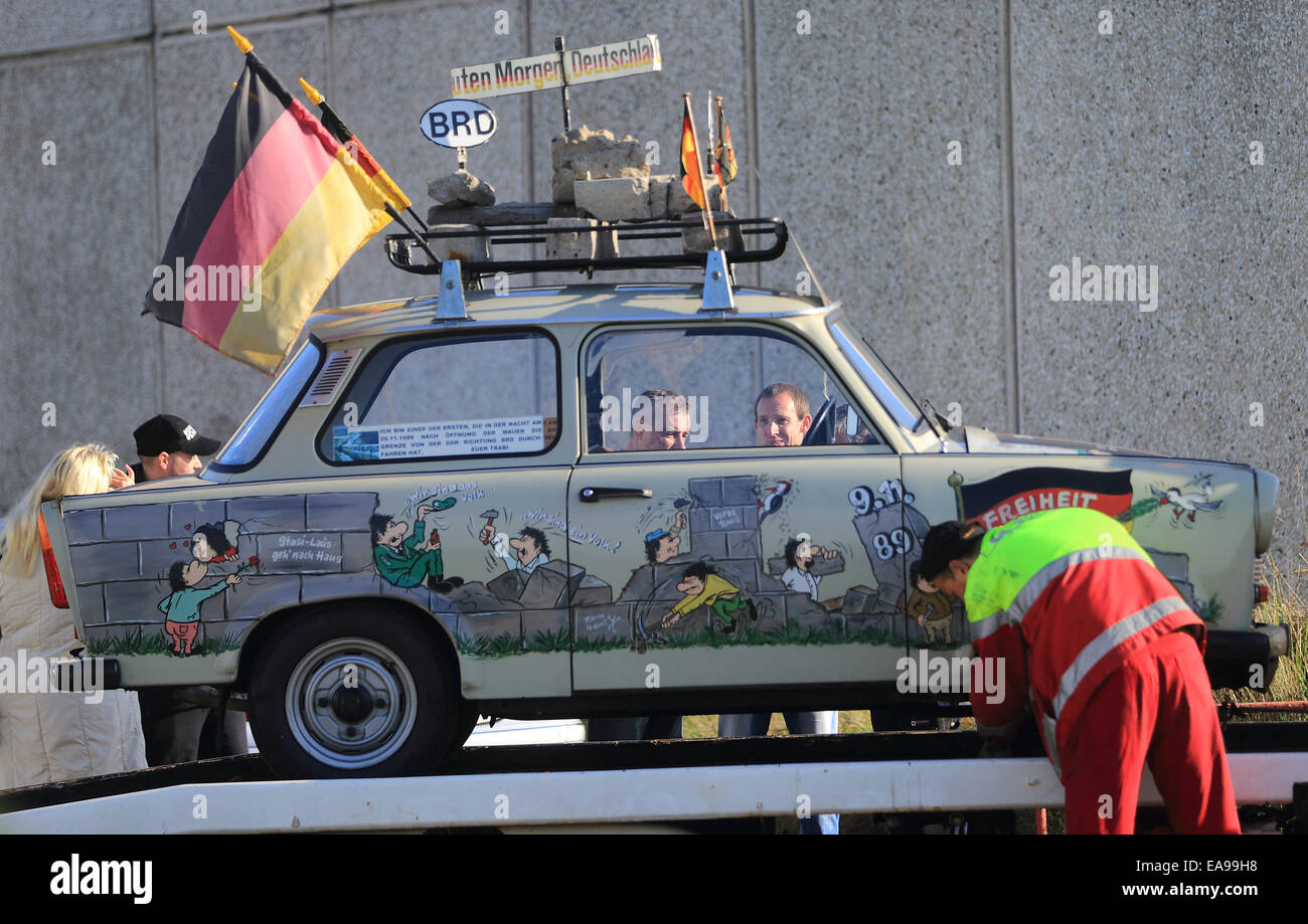 Marienborn, Germany. 9th Nov, 2014. An East German Trabant car model is on display at the memorial site 'Deutsche Teilung' (German Divide) which hosts numerous events on the occasion of the 25th anniversary at the former border corssing in Marienborn, Germany, 9 November 2014. Marienburg was the largest and one of the most important border crossings to East Germany in particular because of its transite rout leading towards West Berlin. Photo: Jens Wolf/dpa/Alamy Live News Stock Photo