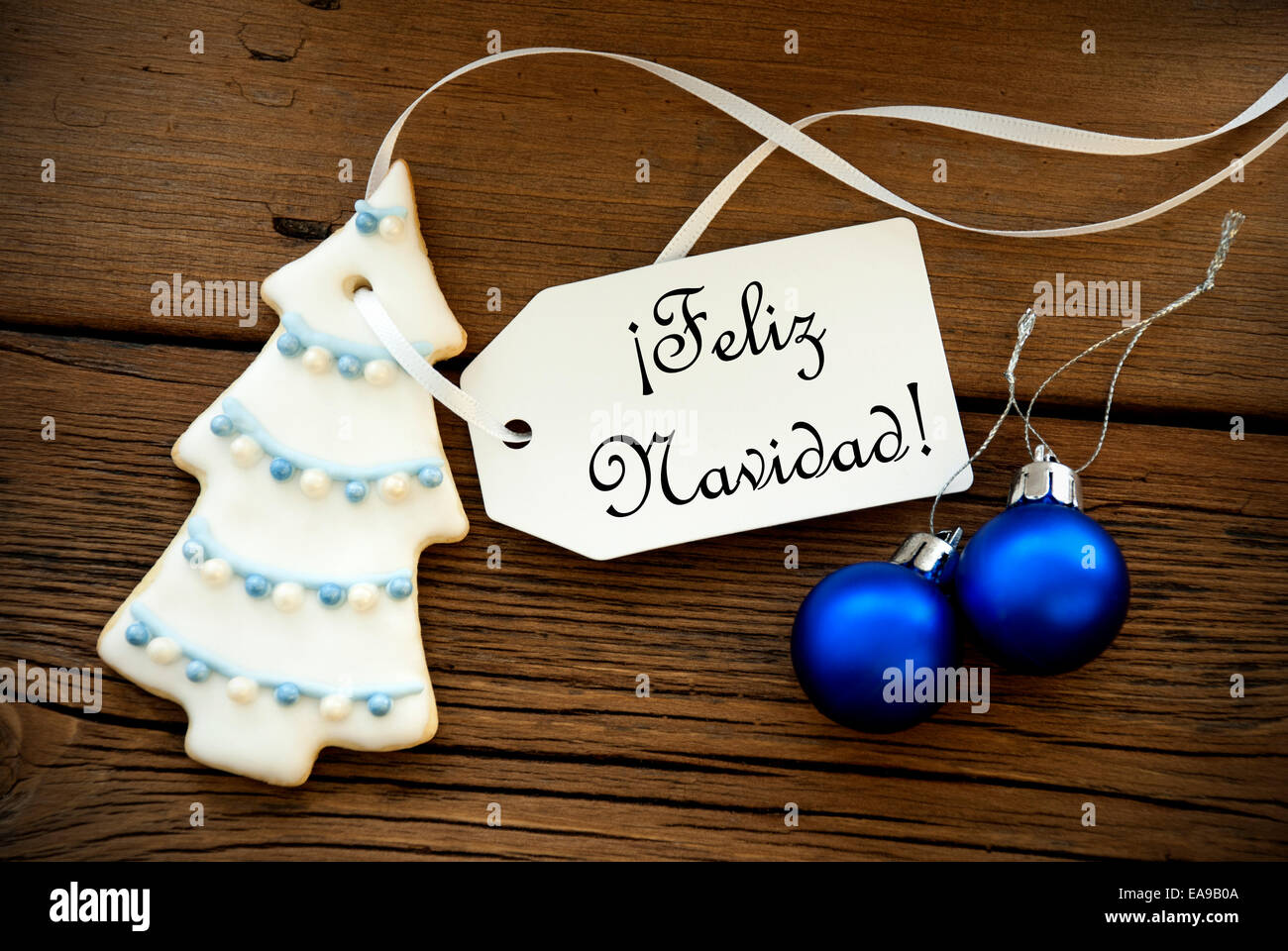 Christmas Background with the Spanish Words Feliz Navidad, which means Merry Christmas on a Label Stock Photo