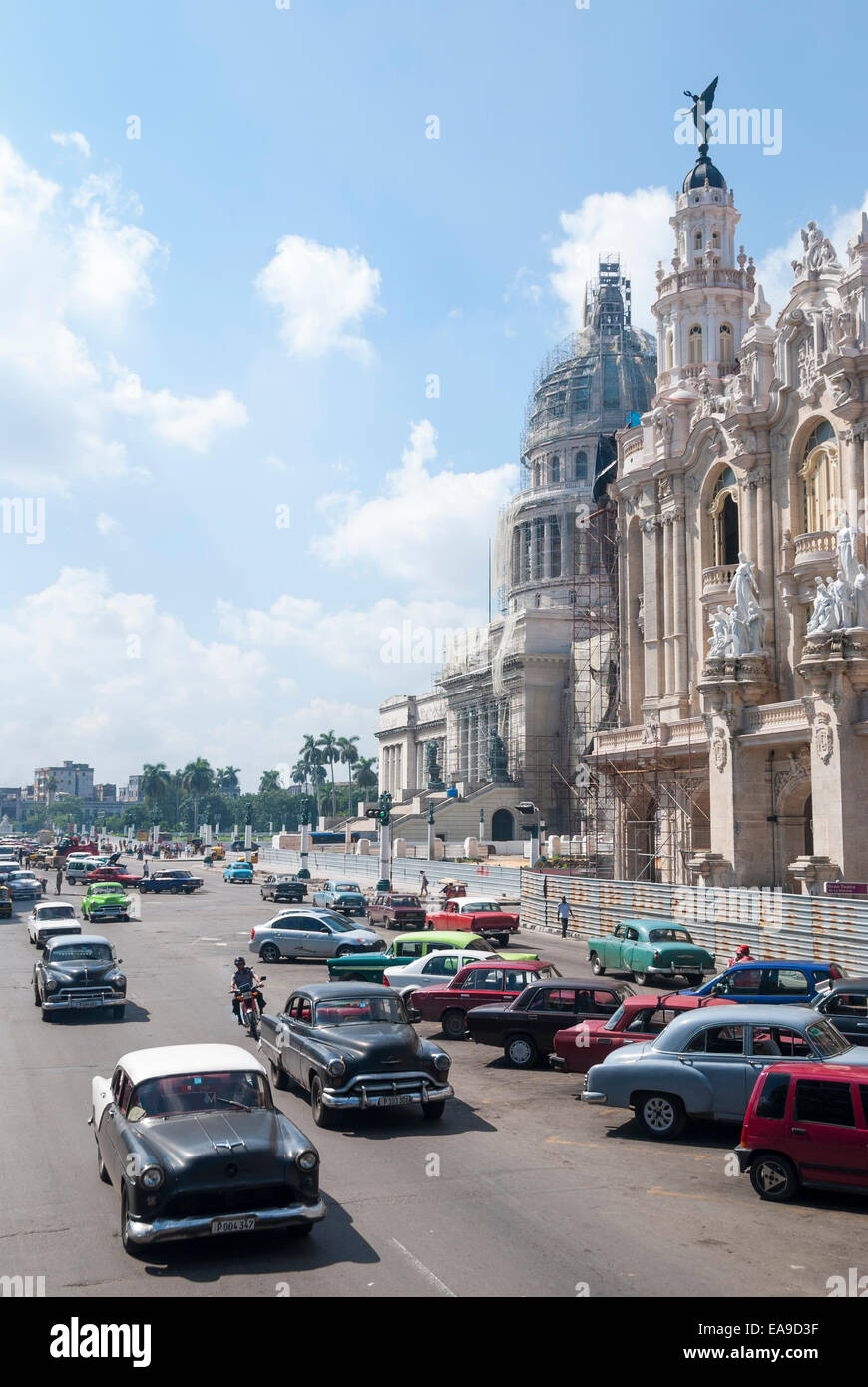 Vintage American automobiles from the 1950s make up the majority of traffic on the Paseo del Prado in Havana Cuba Stock Photo