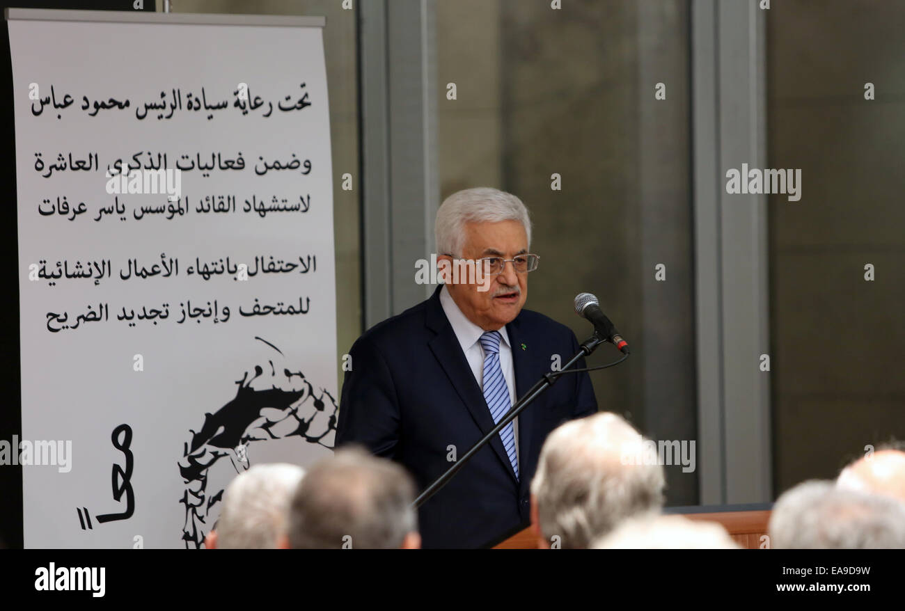 Ramallah. 9th Nov, 2014. Palestinian President Mahmoud Abbas (C) speaks at the opening of a museum of late Palestinian leader Yasser Arafat in the West Bank city of Ramallah, Nov. 9, 2014. Credit:  Pool/Abbas Momani/Xinhua/Alamy Live News Stock Photo