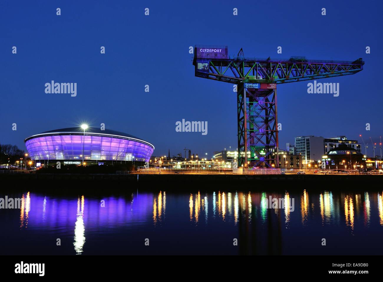 The Finnieston Crane and Hydro arena are are lit up to celebrate the MTV awards at the Hydro Stock Photo