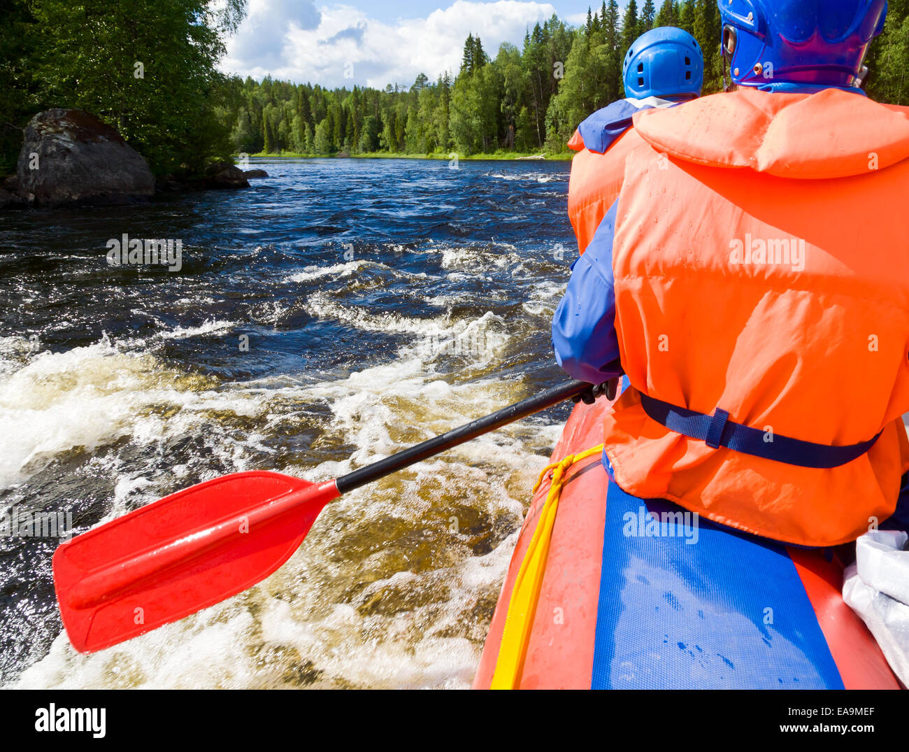 Rafters in a rafting boat on Pistojoki river in Karelia, Russia Stock Photo