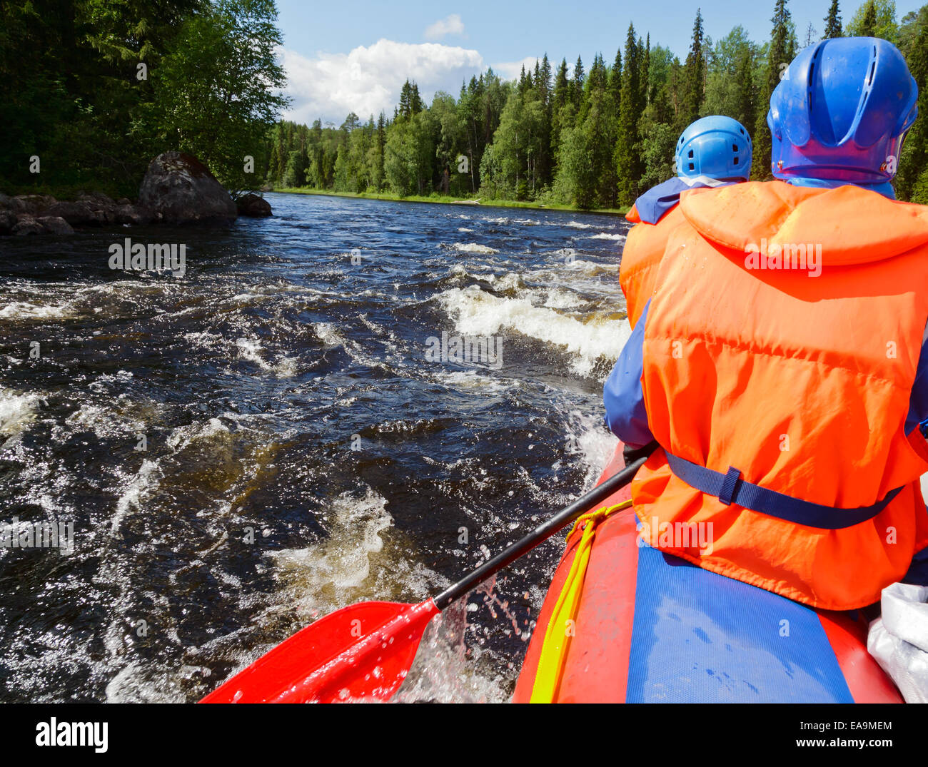 Rafters in a rafting boat on Pistojoki river in Karelia, Russia Stock Photo