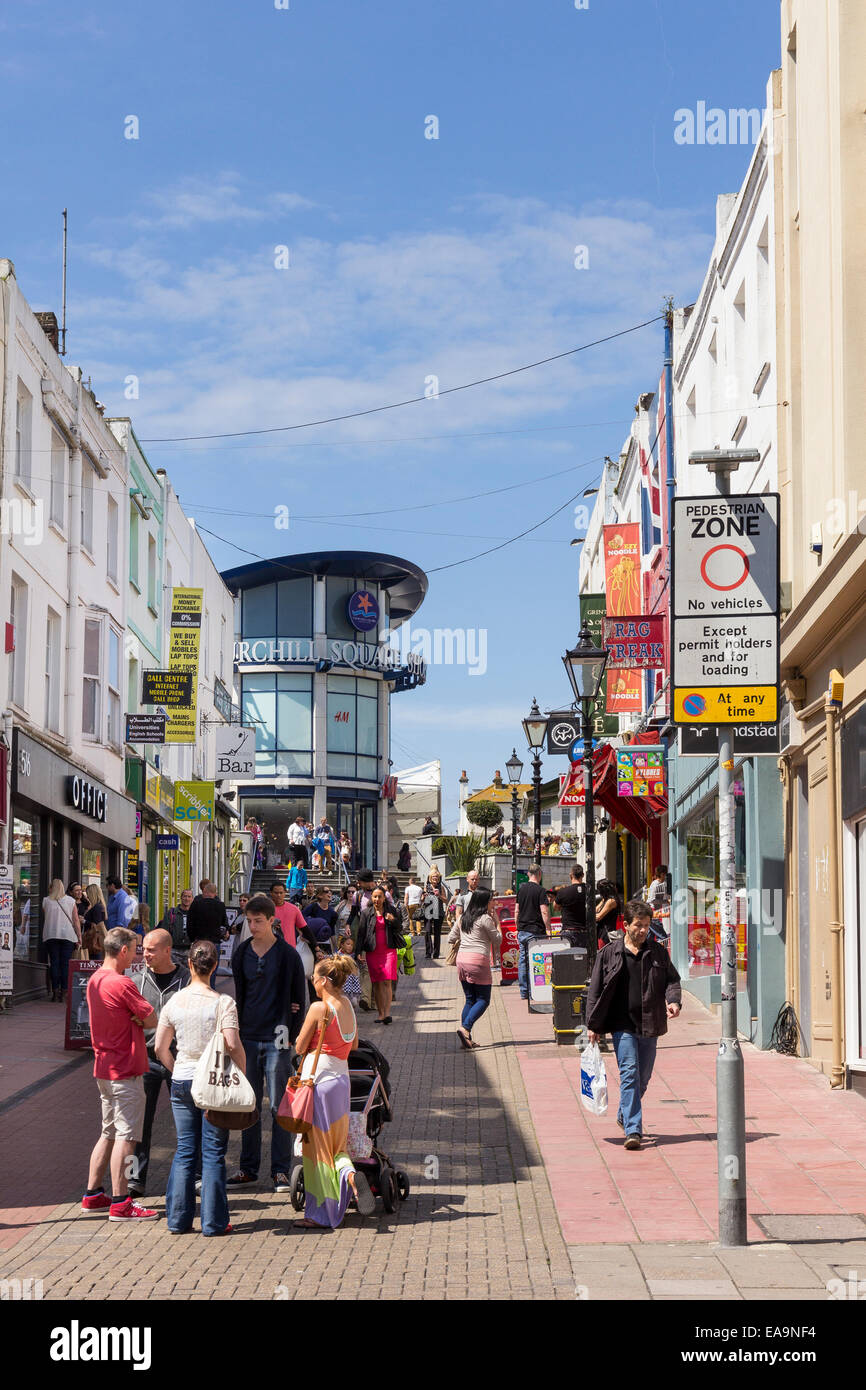 Cranbourne Street is a busy pedestrianised shopping street in Brighton, Sussex leading to the Churchill Square shopping centre. Stock Photo