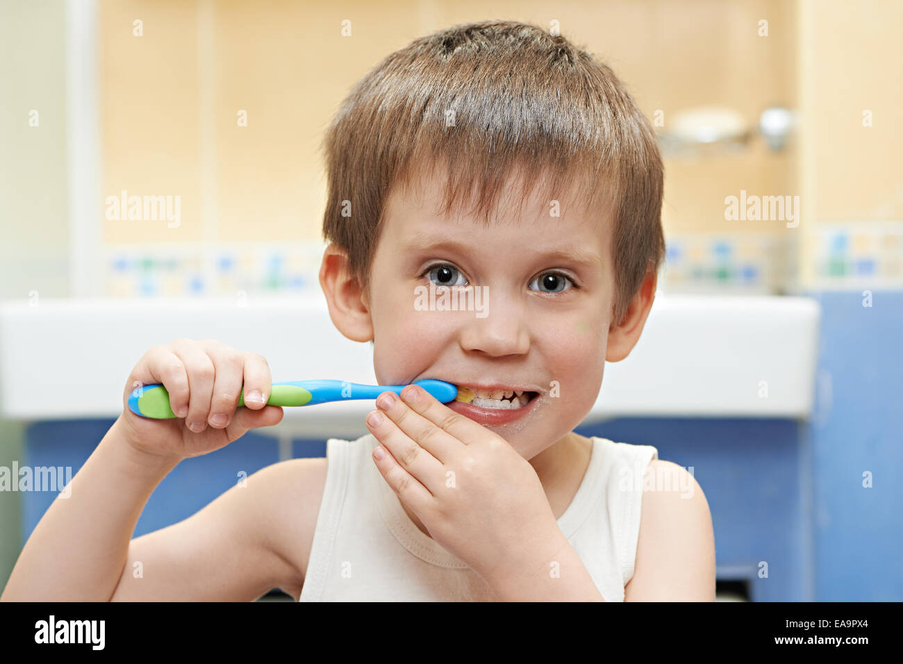 Little boy brushing his teeth in the bathroom Stock Photo Alamy